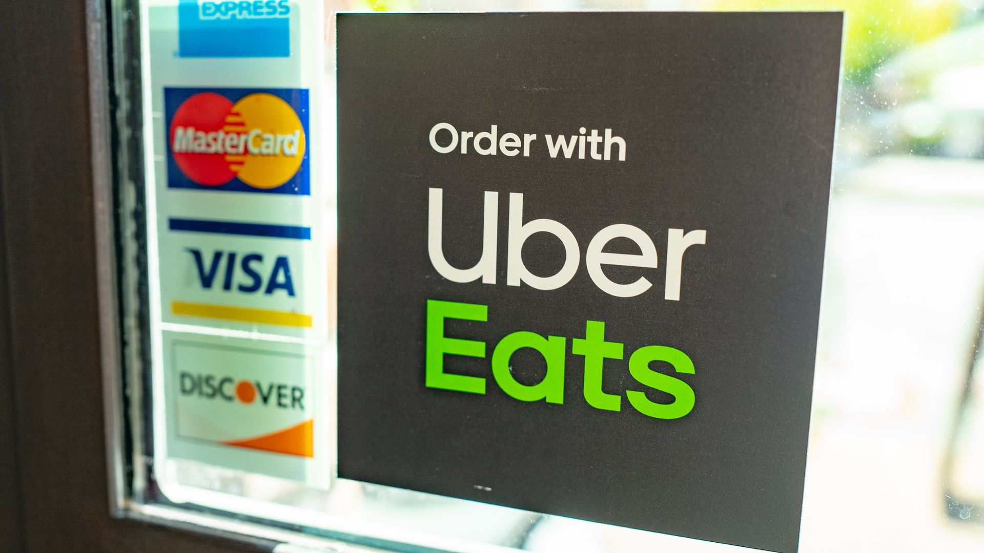 Uber Eats sign on a door