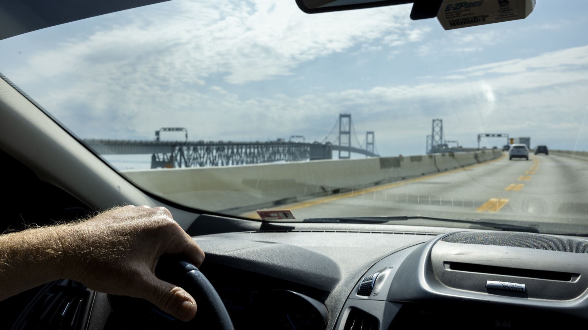 A person driving on the Bay Bridge