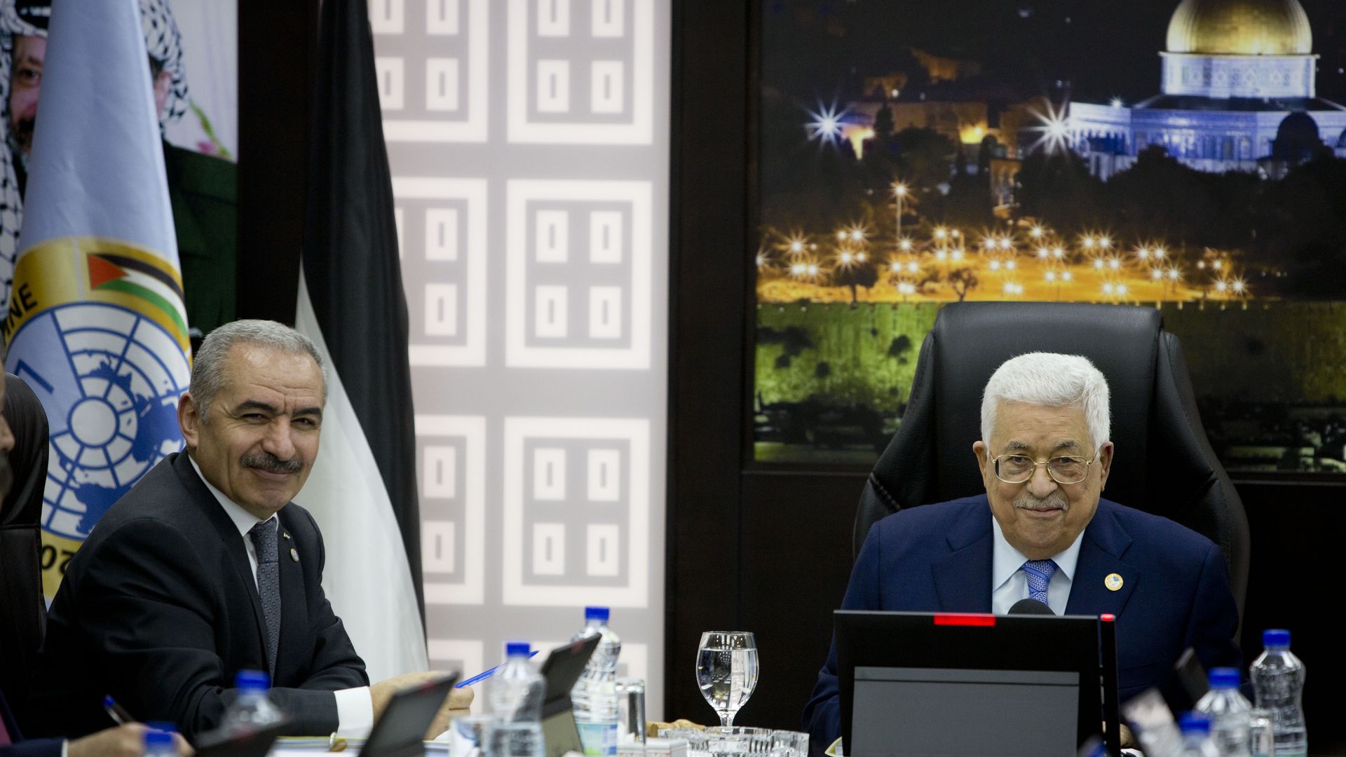 Abbas (R) with Prime Minister Mohammad Shtayyeh at a Cabinet meeting.