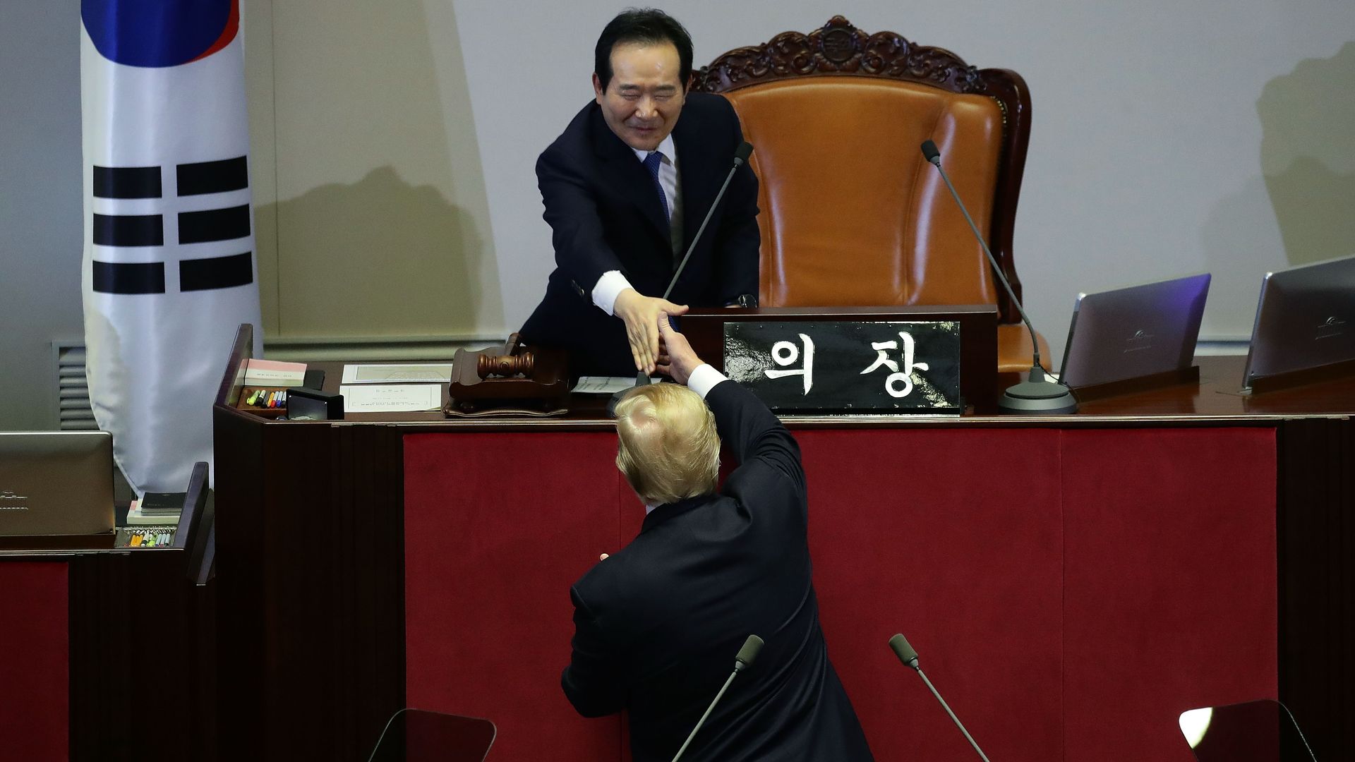 President Donald Trump shakes hands with speaker of South Korean national assembly Chung Sye-Kyun.