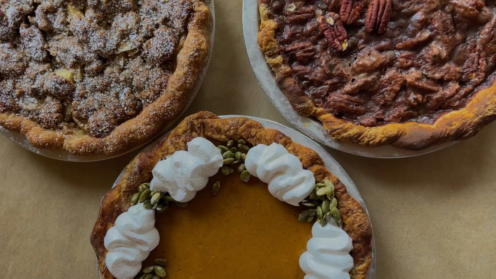 Three pies are viewed from above.