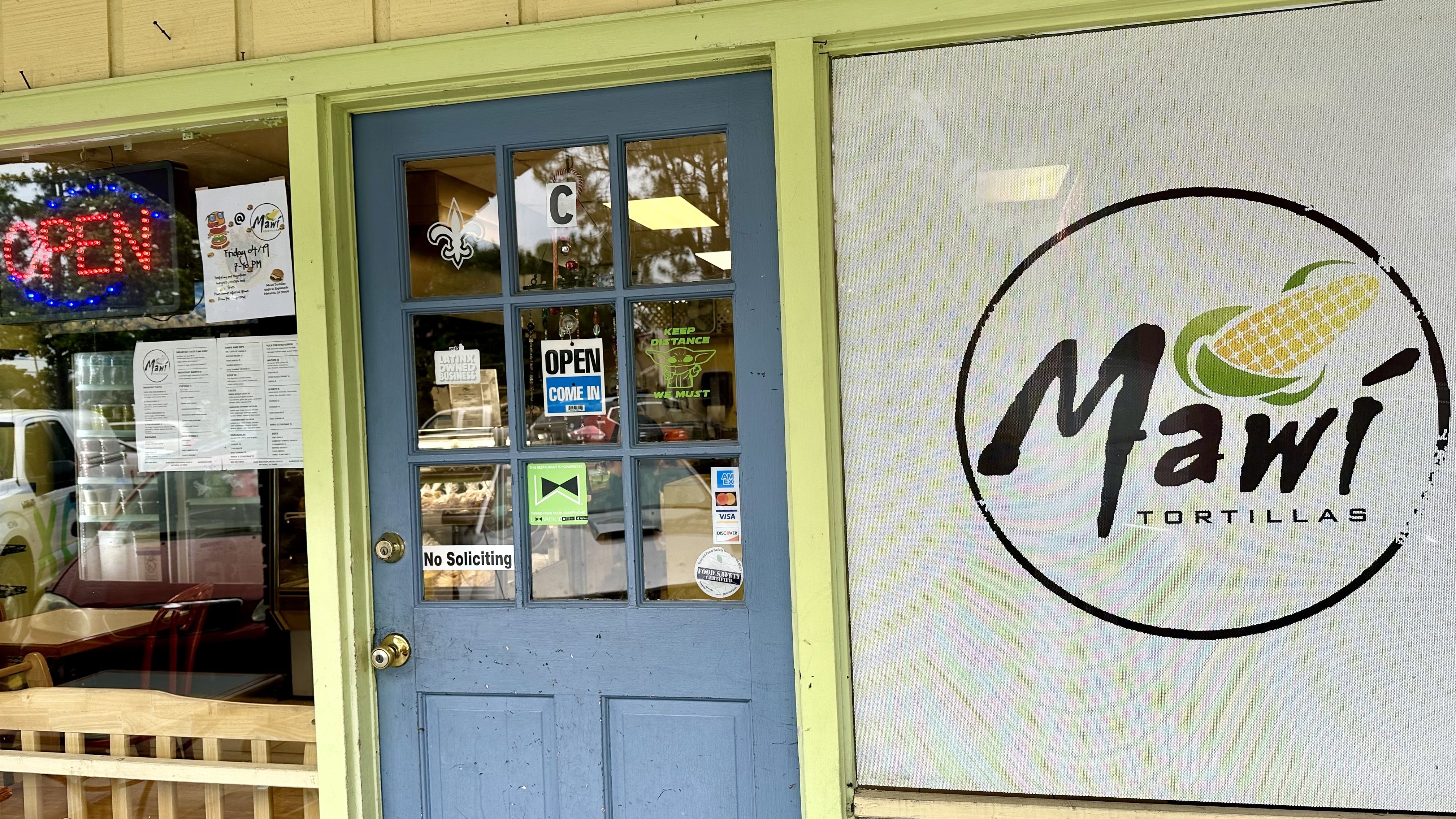 Photo shows the door of Mawi Tortillas