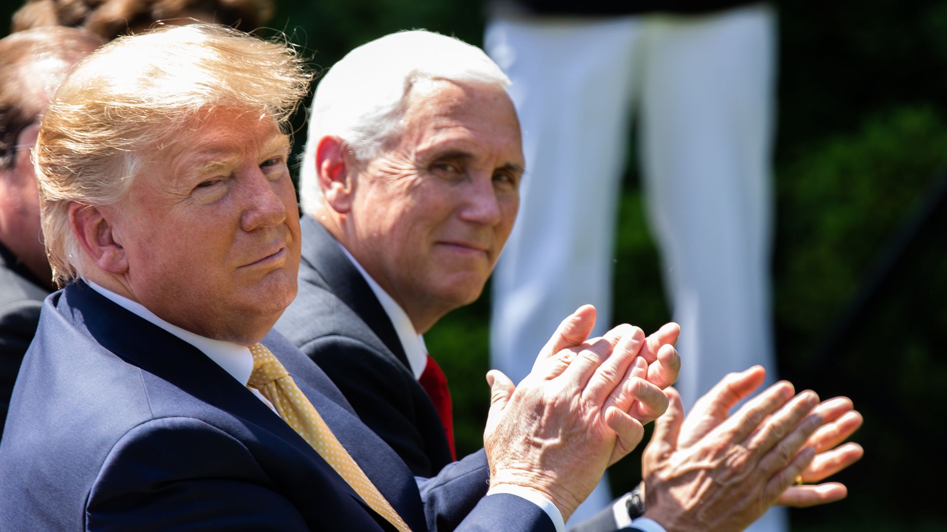 Trump and Pence clapping