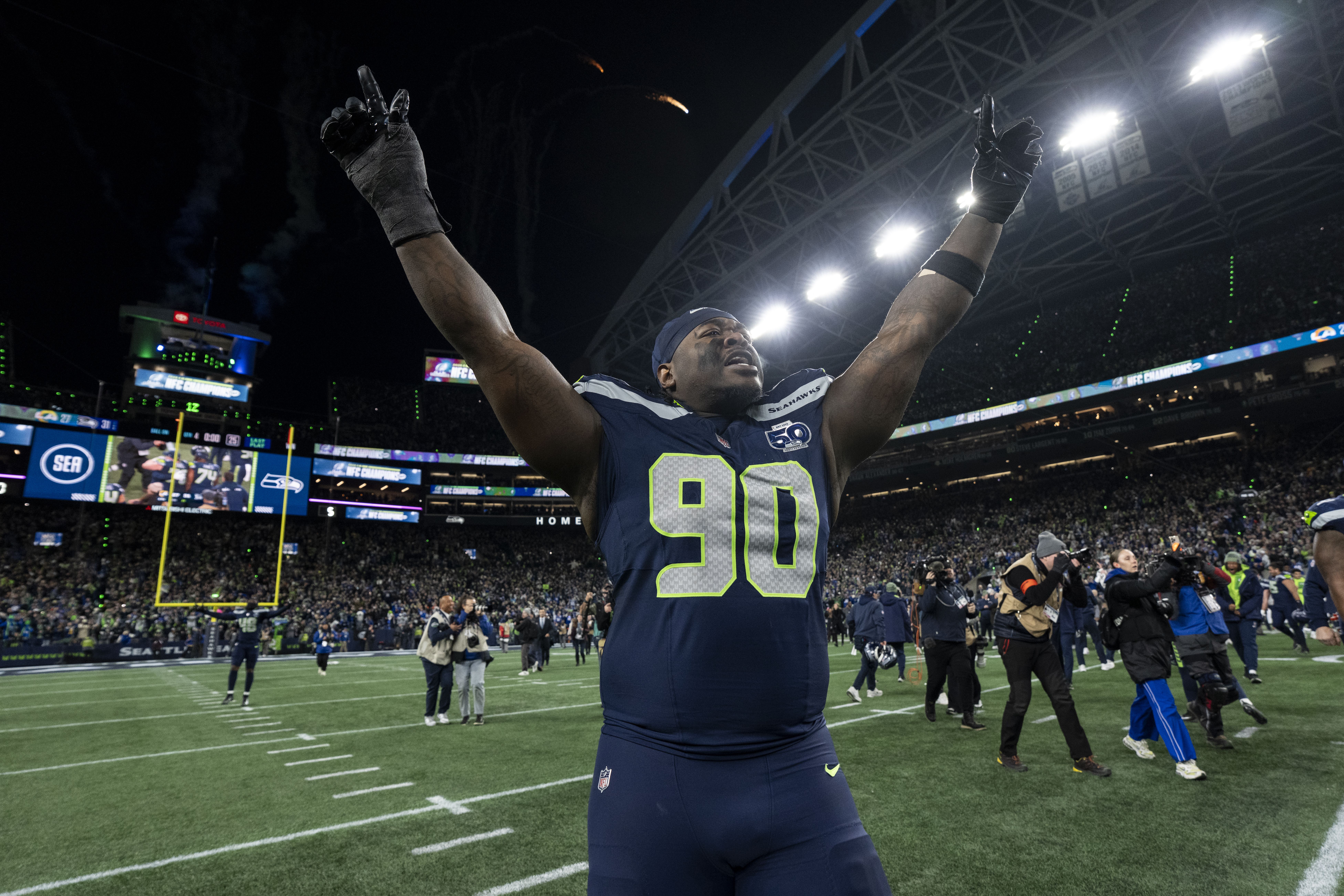 Jarran Reed #90 of the Seattle Seahawks celebrates after defeating the Los Angeles Rams following an NFC Championship NFL football game at Lumen Field on January 25, 2026 in Seattle, Washington. (Photo by Michael Owens/Getty Images)