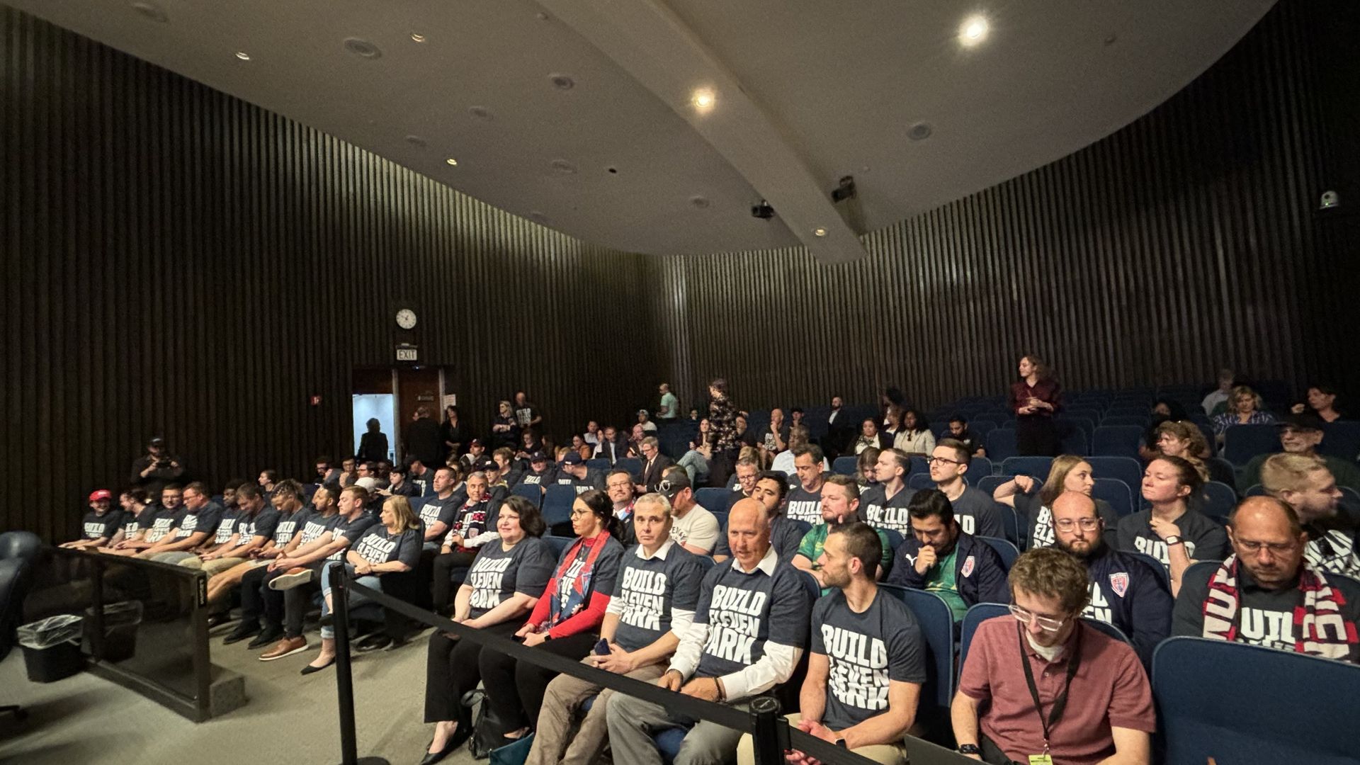 Eleven fans at a meeting