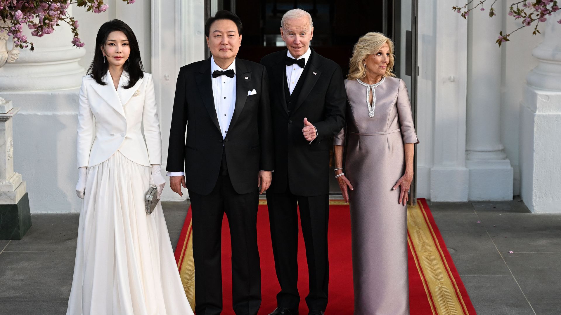 South Korean President Yoon Suk Yeol and his wife, Kim Keon Hee, pose with President Biden first lady Jill Biden before a  State Dinner at the White House on April 26, 2023.