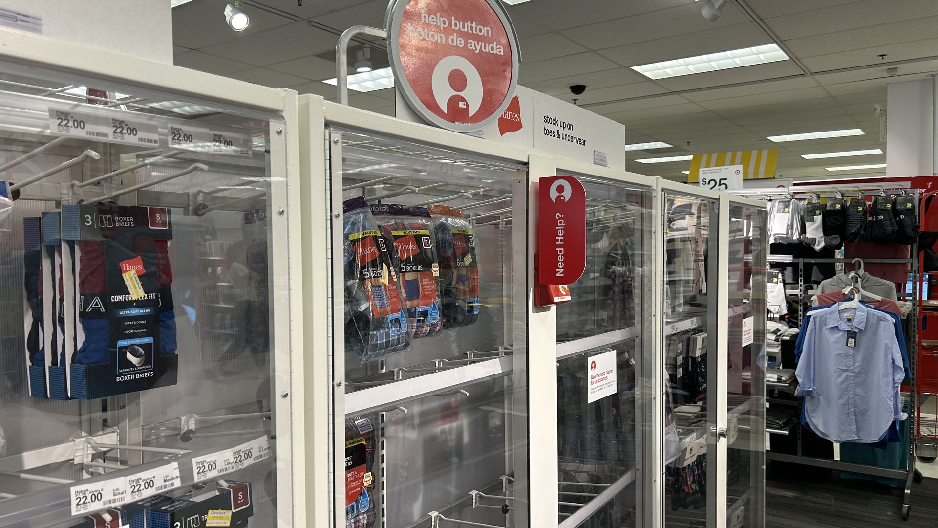 Clothing locked behind a glass case in a Target store 