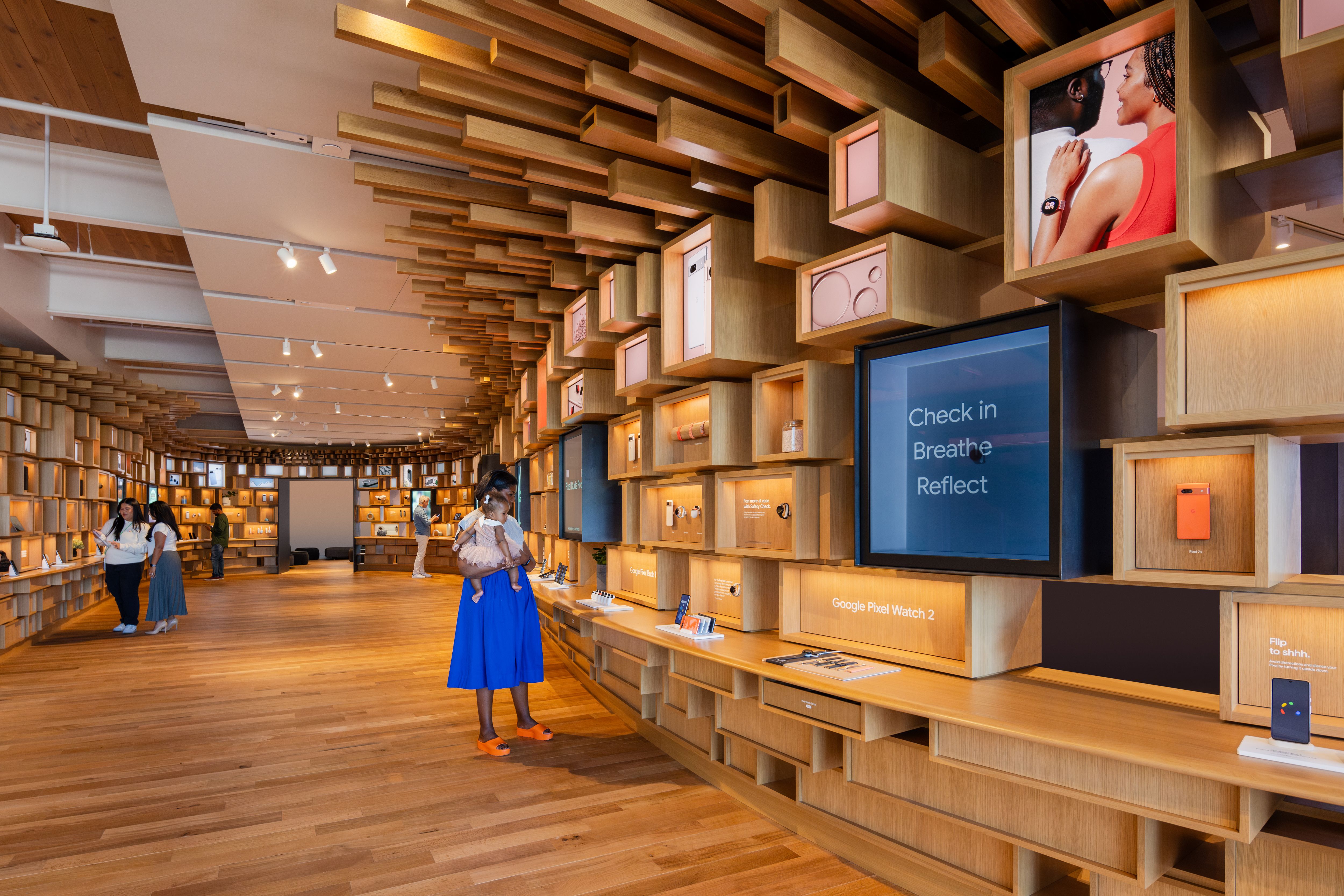 Photo of the interior of a Google Store with boxes protruding from the sides