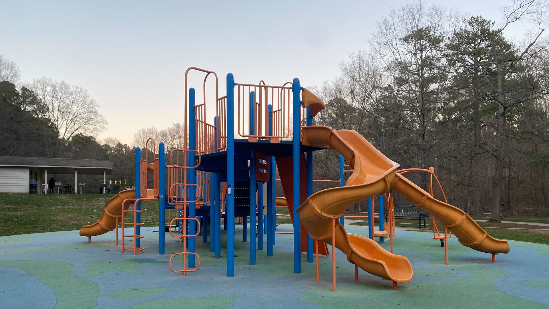 A playground with three slides 
