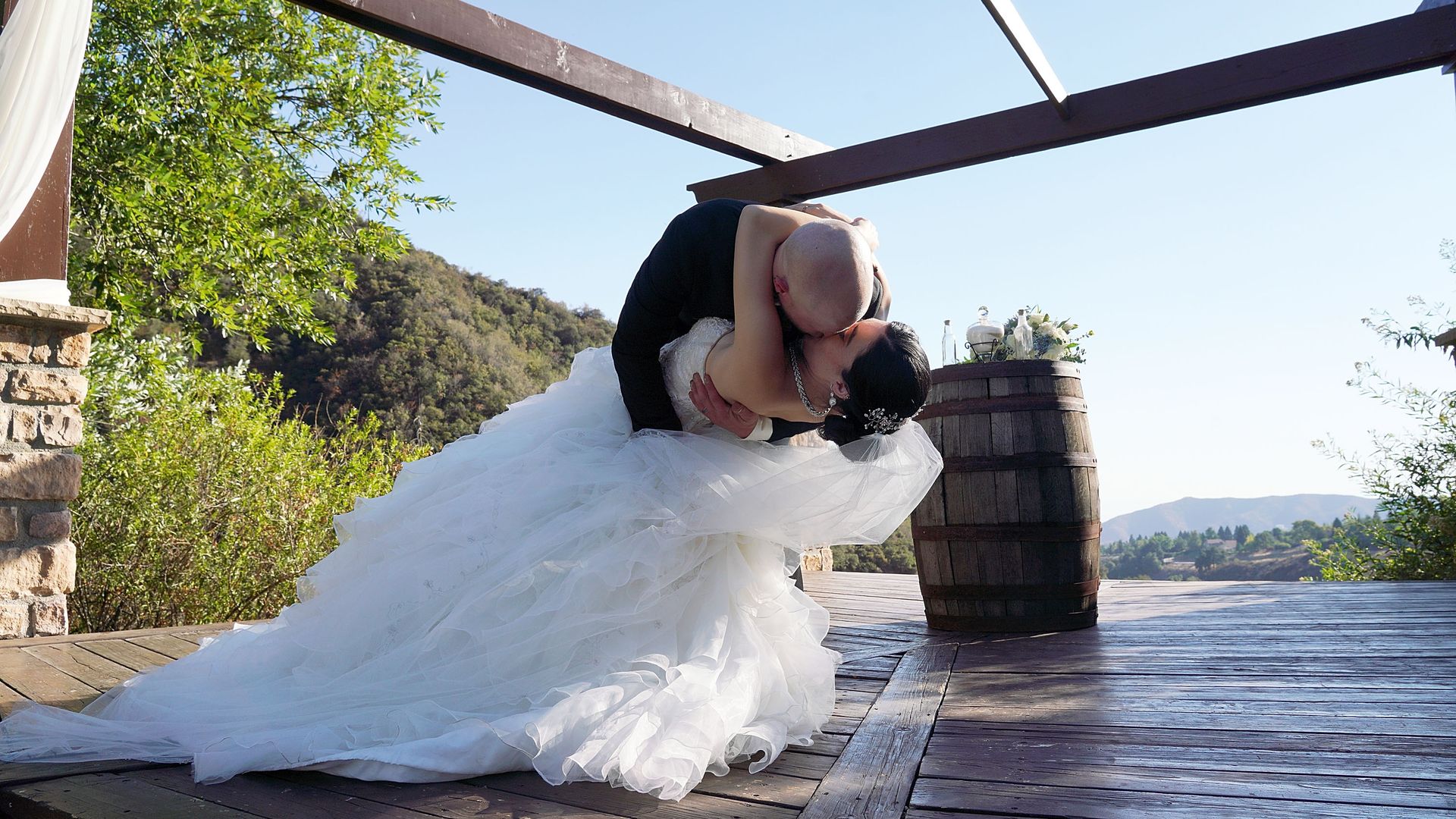 Groom and bride kissing