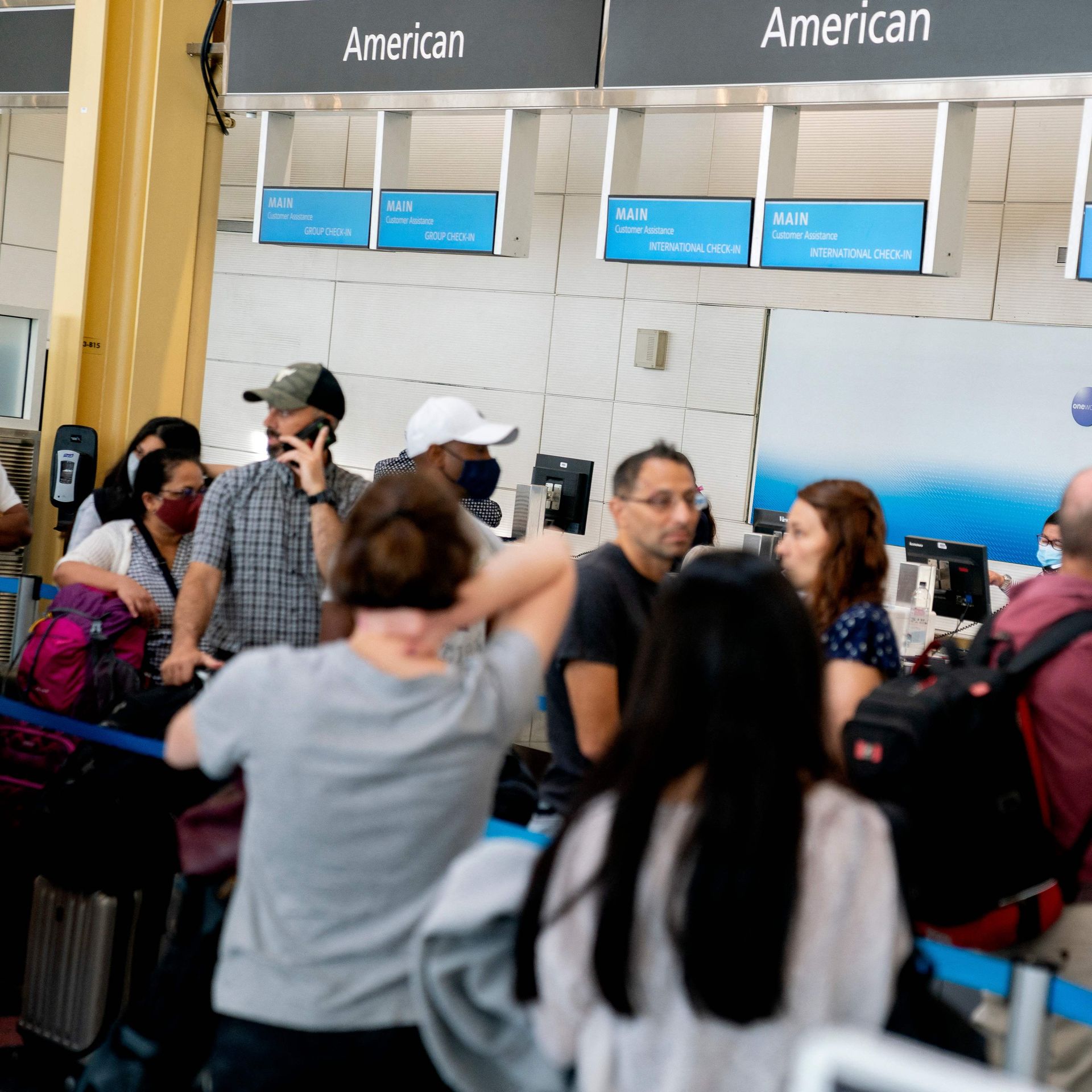Upset passengers at an American Airlines gate