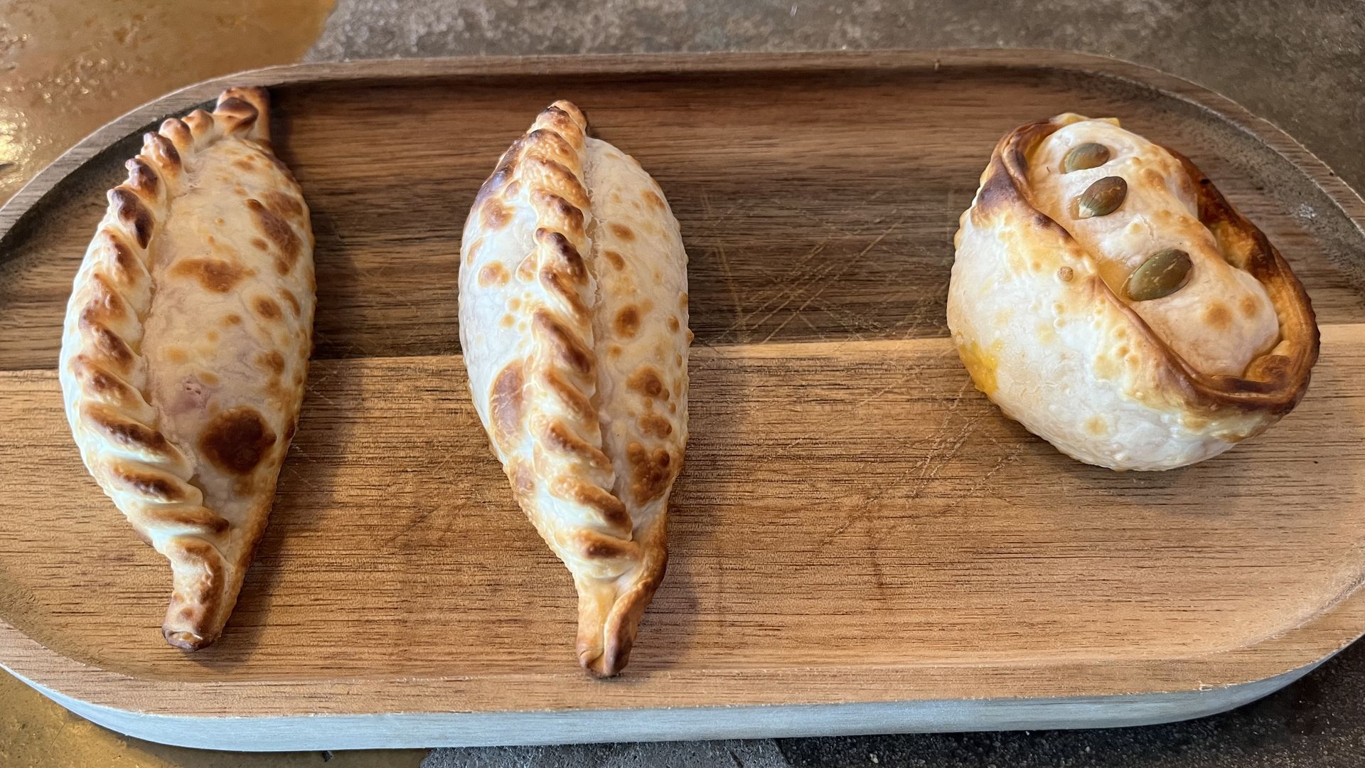 The blue cheese (left) and squash empanadas from Sur.