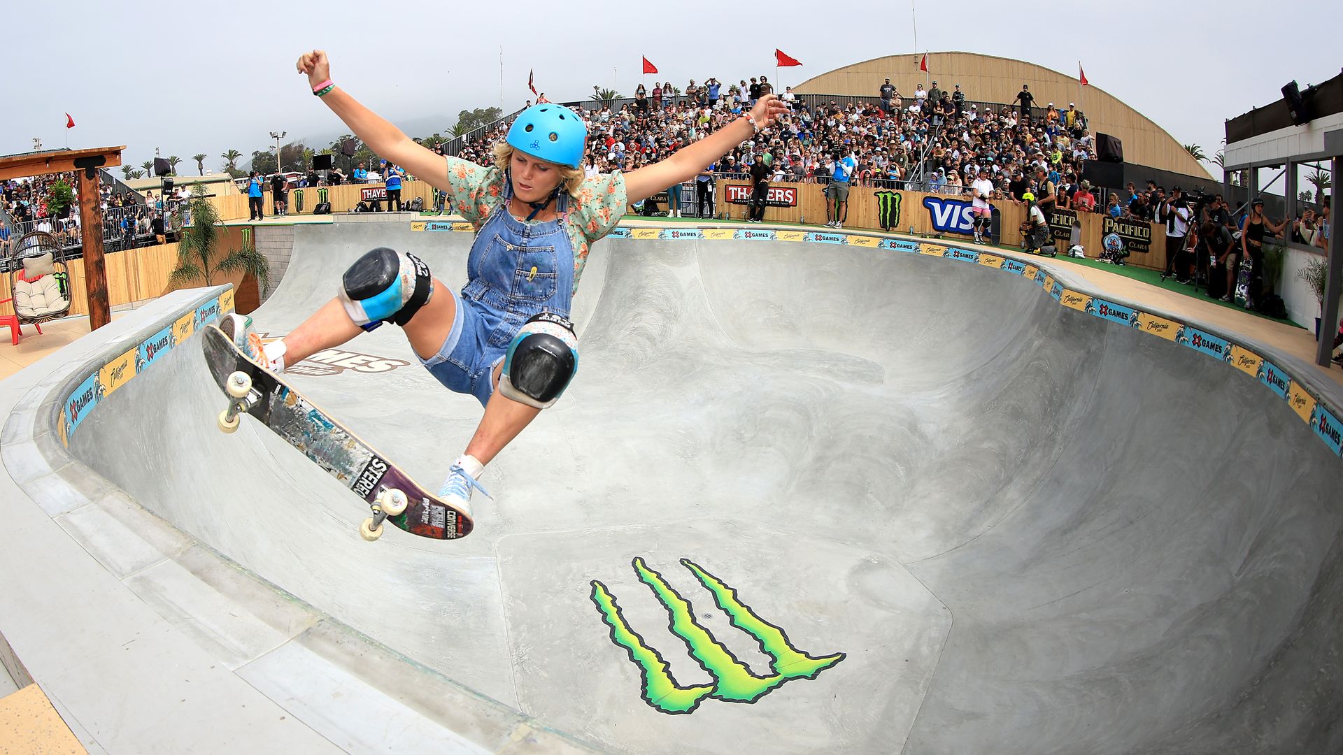 Bryce Wettstein in the air while skating in a pool