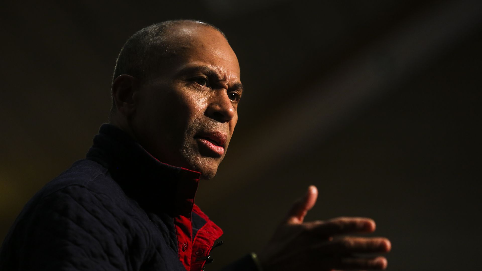 Close-up shot of former Massachusetts Governor Deval Patrick at a presidential campaign event