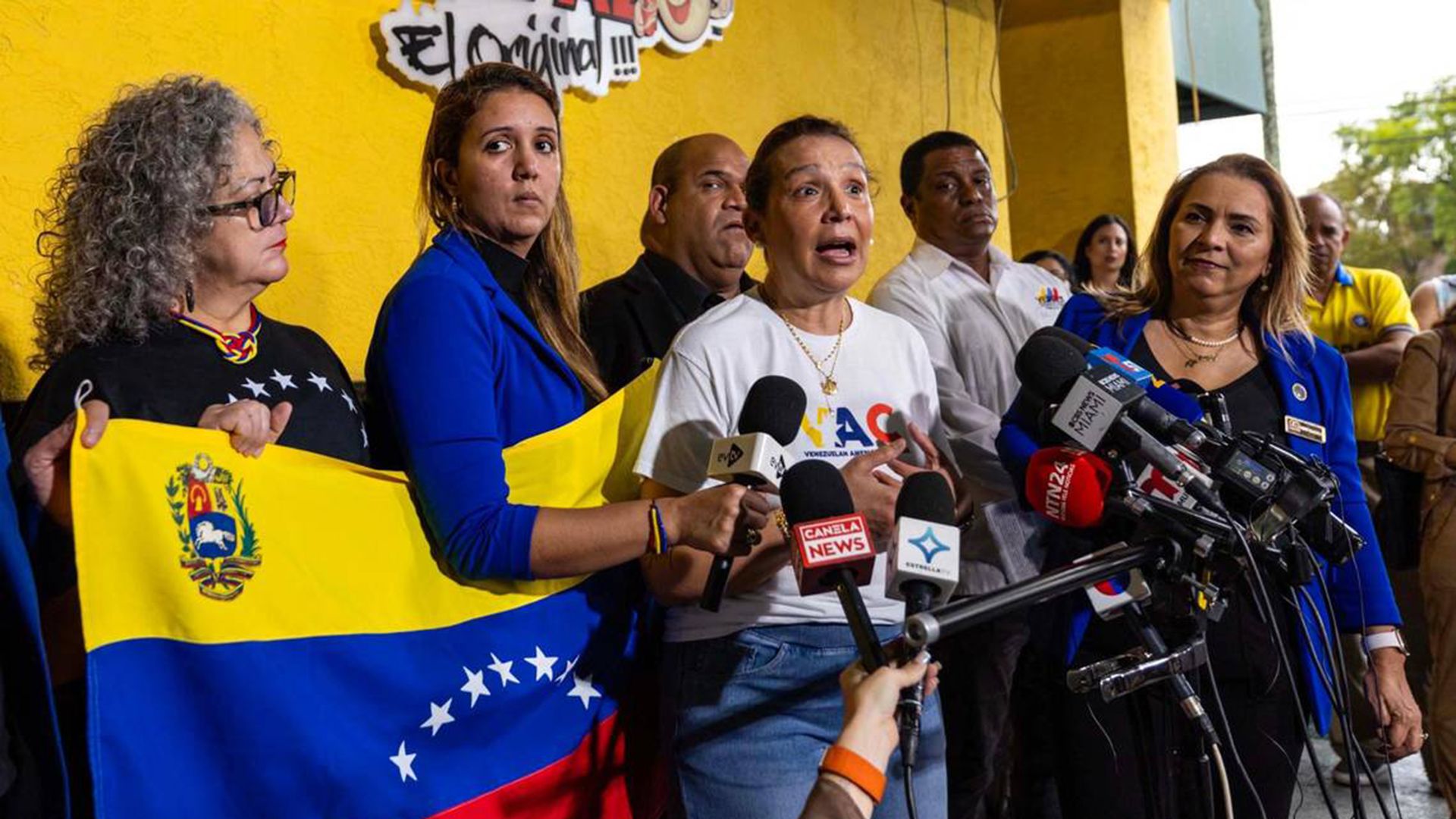 Executive Director of Venezuelan American Caucus, Adelys Ferro, speaks to the media during a press conference.