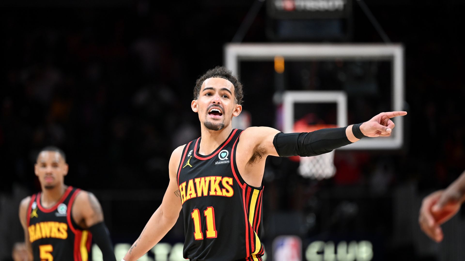 NBA star Trae Young shows up to a game with Lionel Messi's