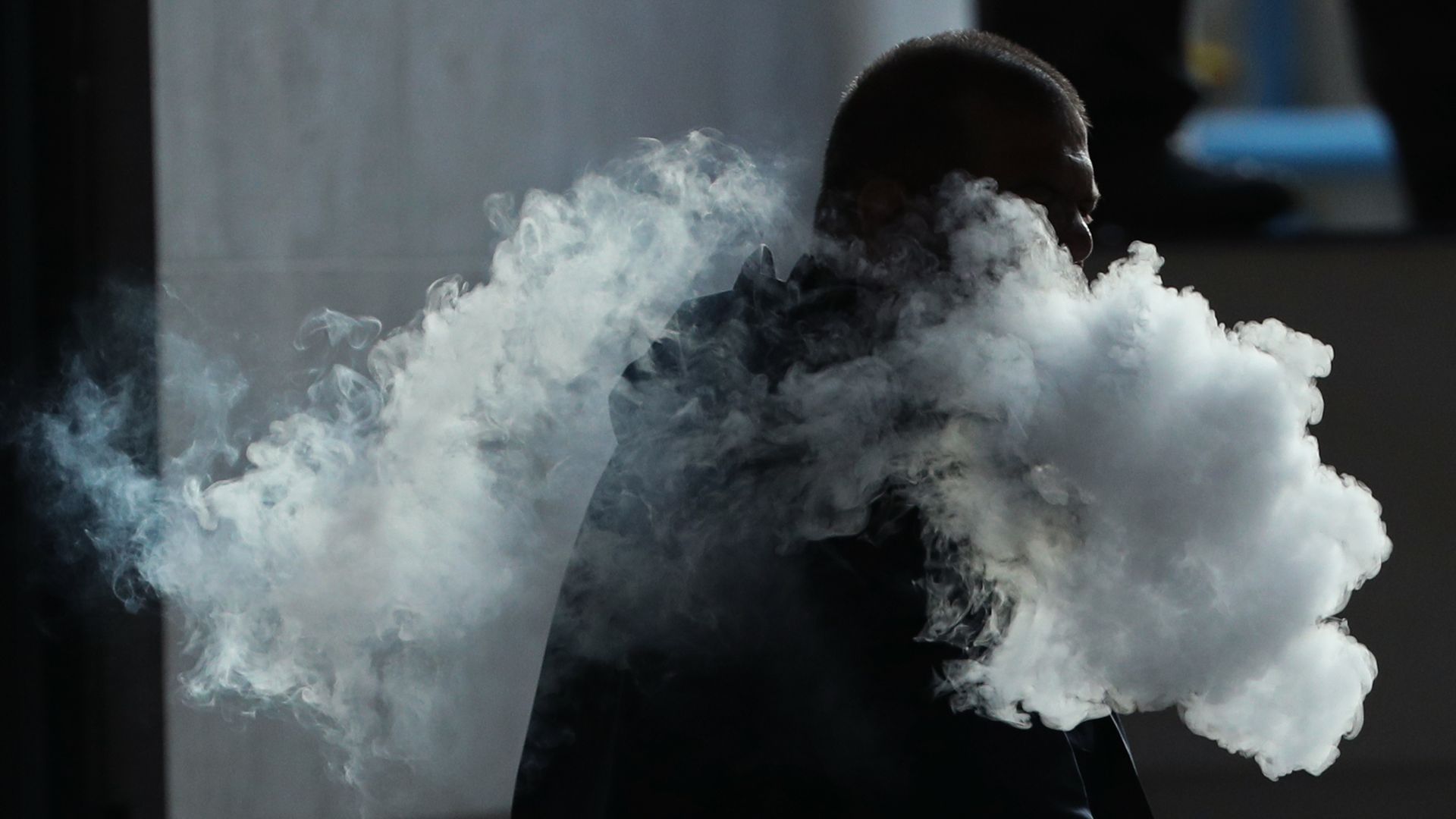 A person vaping.