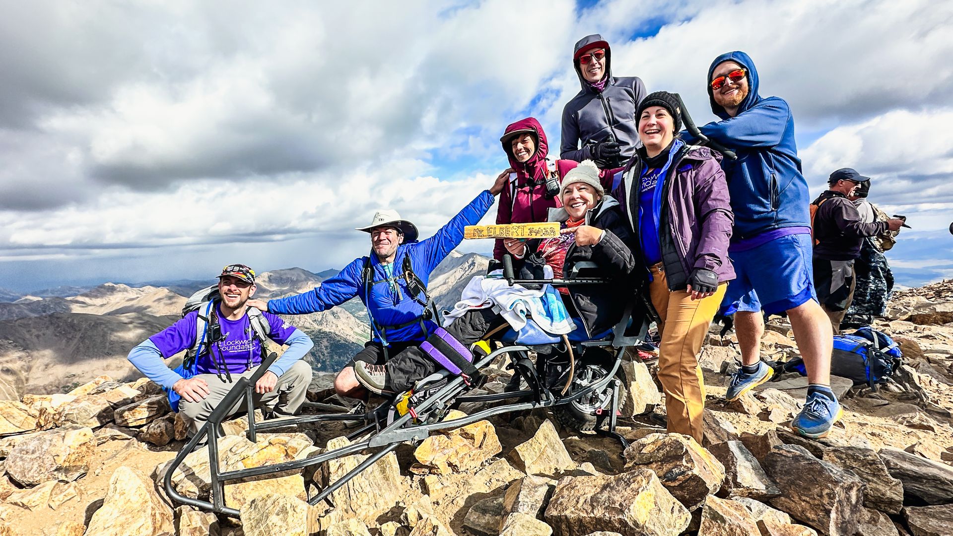 Chris Shively Layne and volunteers atop Mt. Elbert in Colorado.