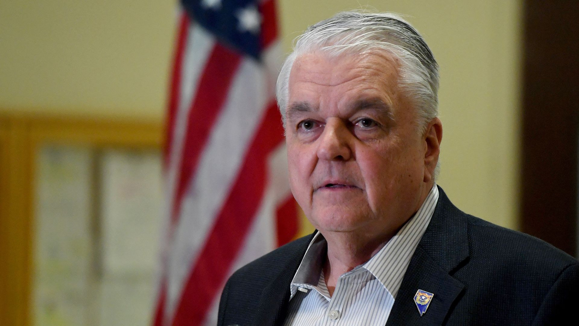 Nevada Gov. Steve Sisolak speaking in March 2020.