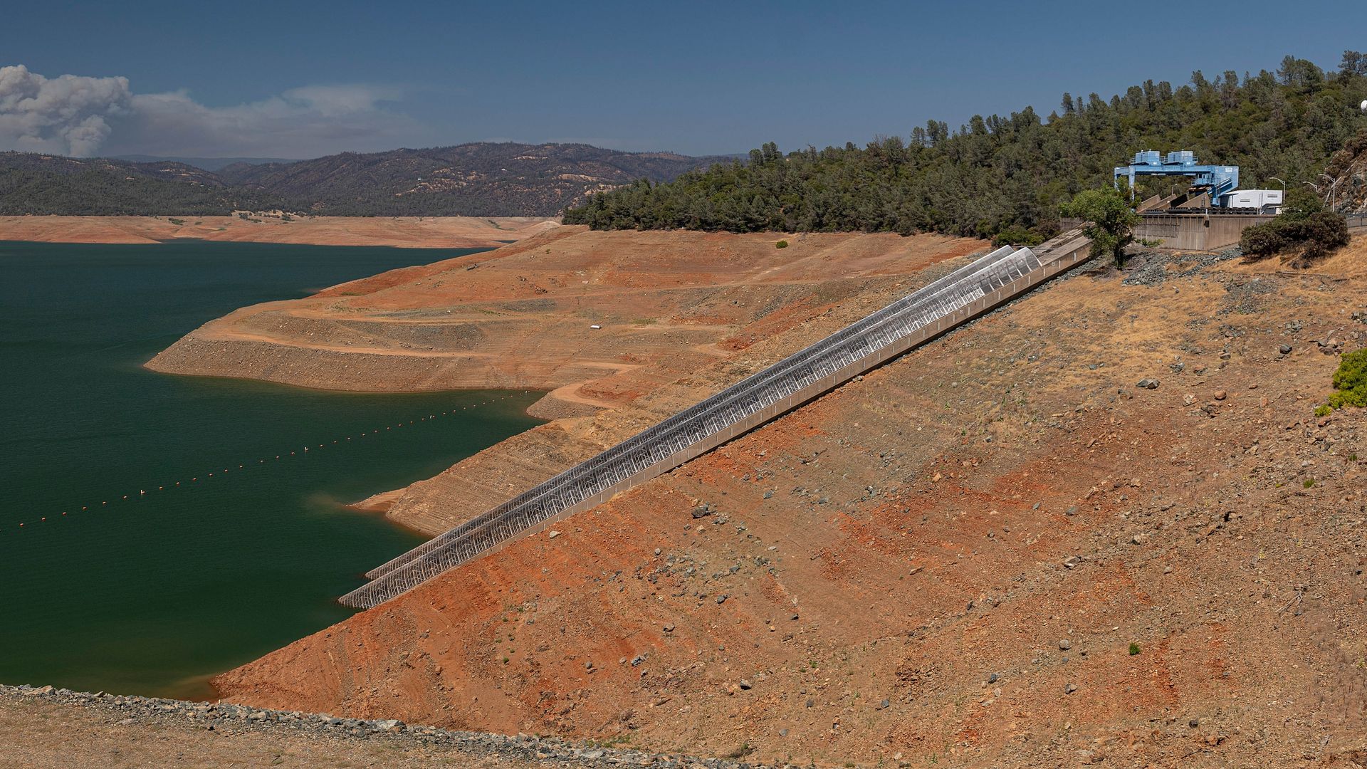 Penstock intakes for the Hyatt Powerplant at Lake Oroville during a drought in Oroville, California, U.S., on Thursday, July 15, 2021.