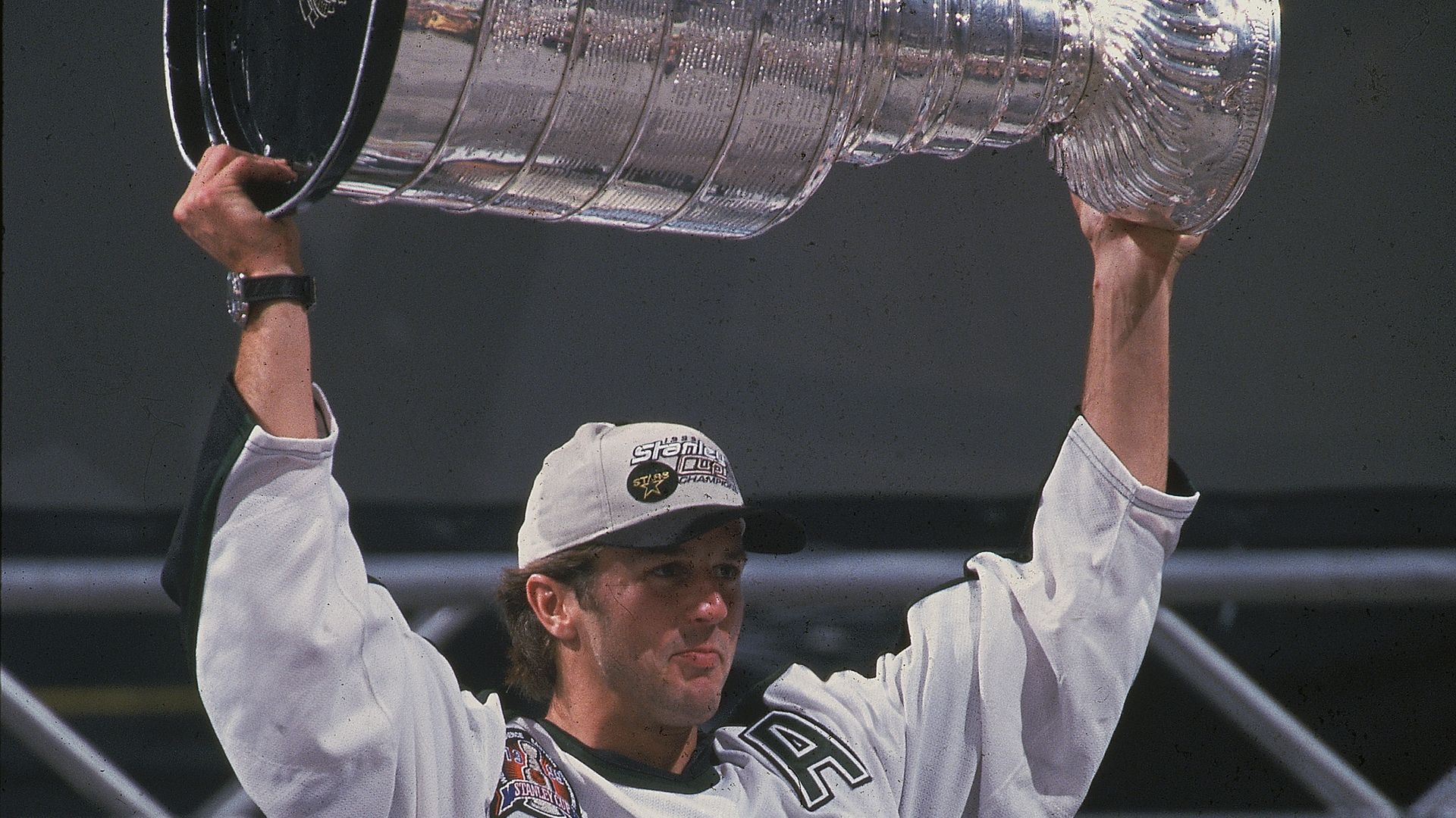 A photo of Dallas Stars legend Mike Modano hoisting the Stanley Cup