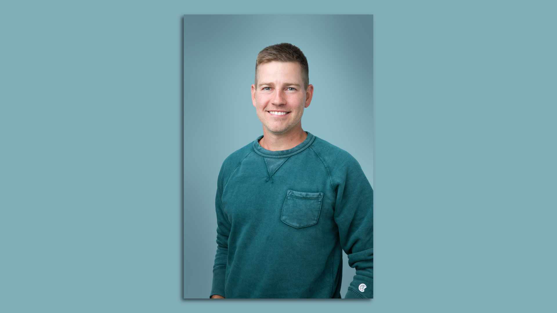 A headshot of a white man