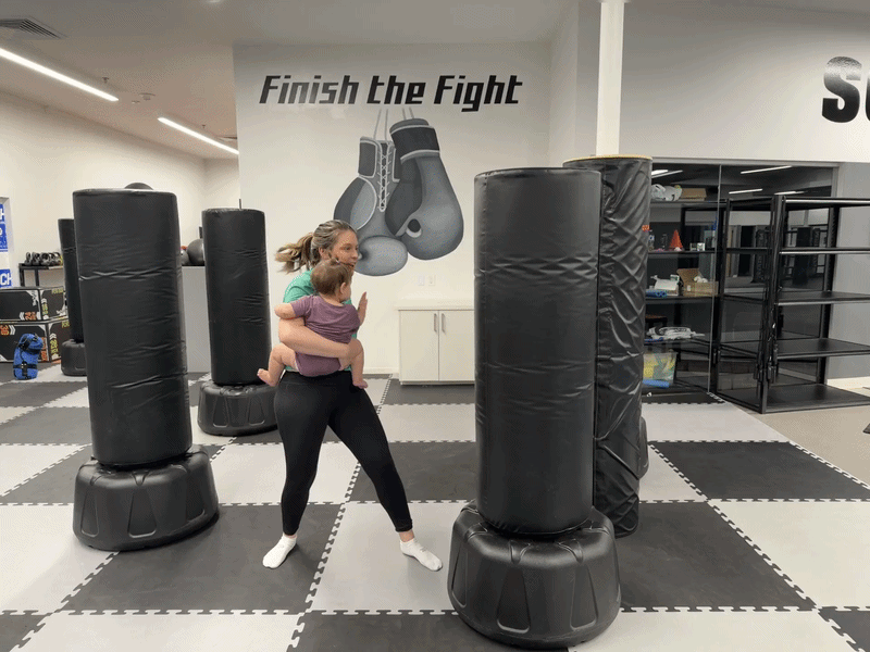 Jessica and her daughter test out Krav Mama. Photo: EVKM Self Defense & Fitness