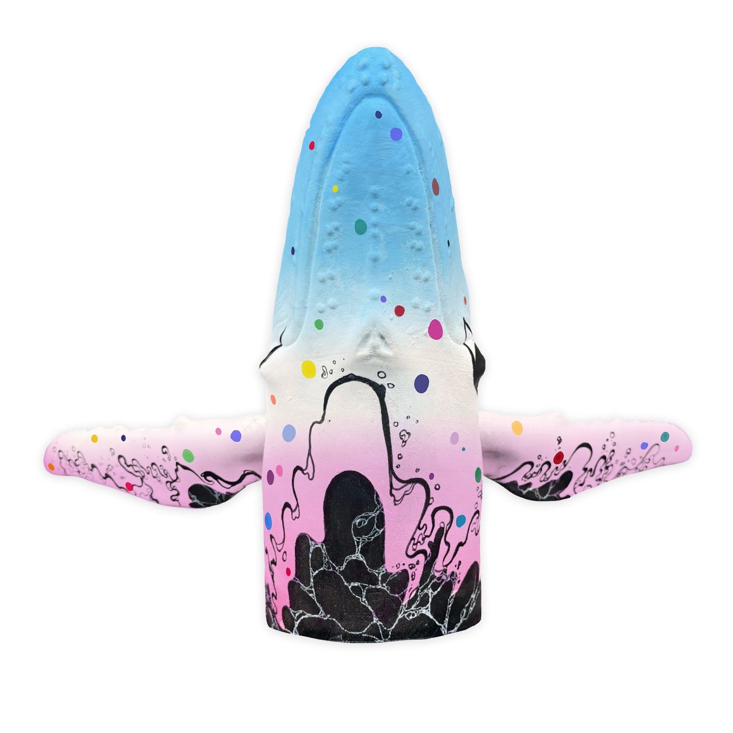 A whale with colorful patterns and designs printed on it.