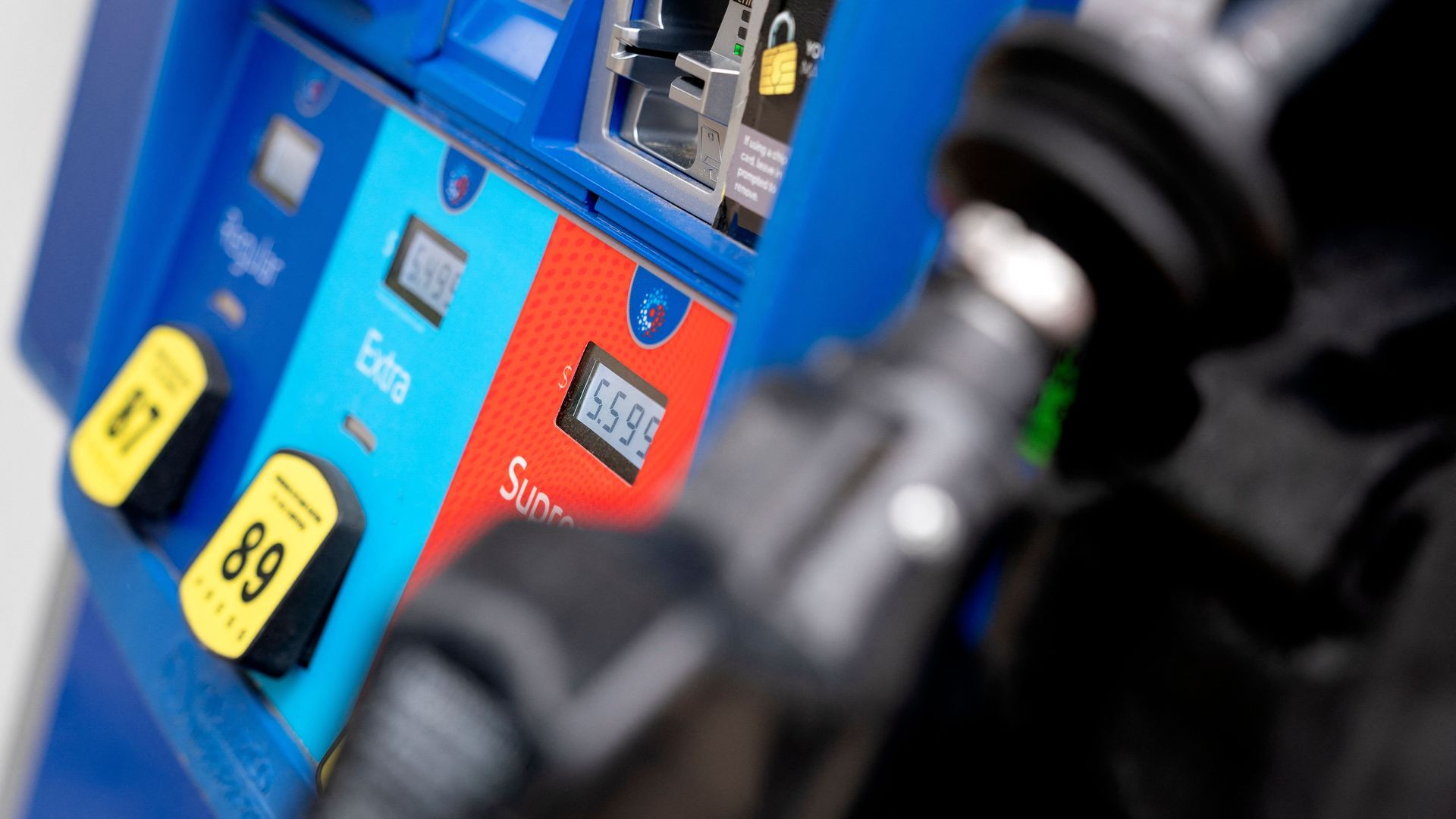 Gas prices are displayed on a gas pump at an Exxon gas station in Washington, D.C.