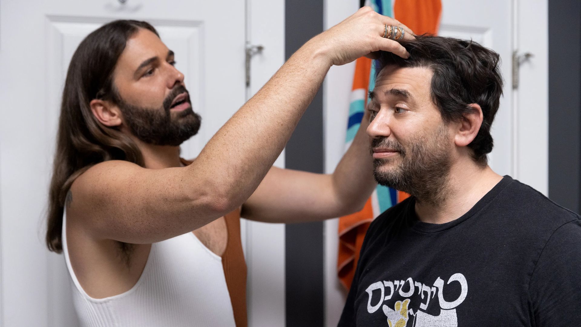 Photo shows Dan Stein and hairstylist Jonathan Van Ness on the set of "Queer Eye" in New Orleans