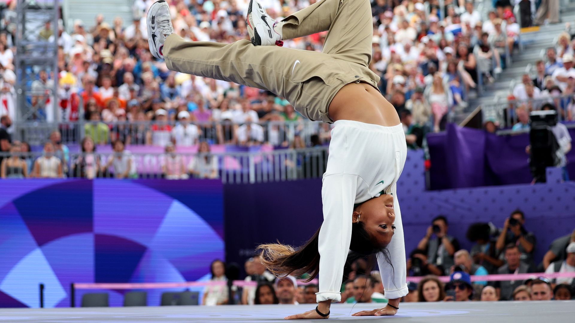 Logan Edra in a handstand during her routine at the Olympics.