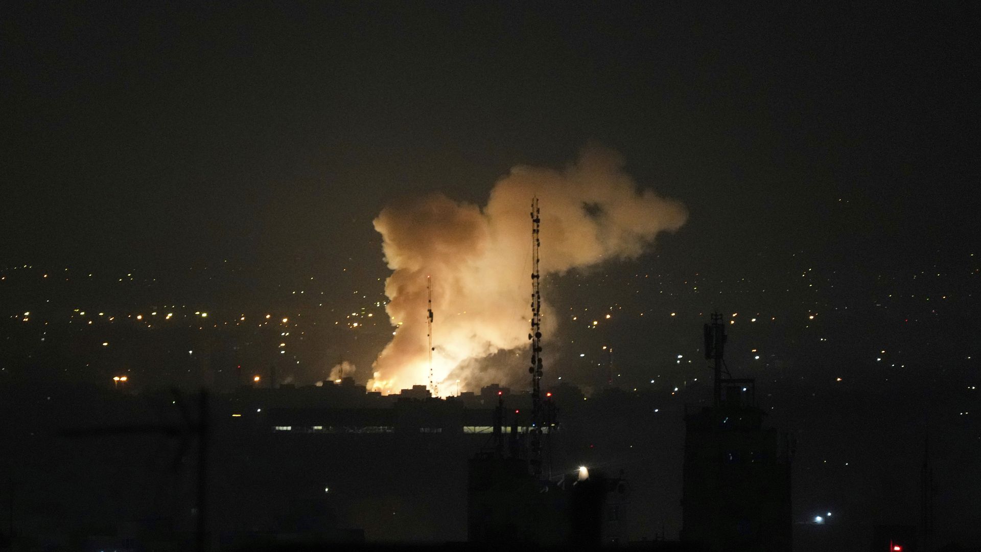 smoke and fire over city