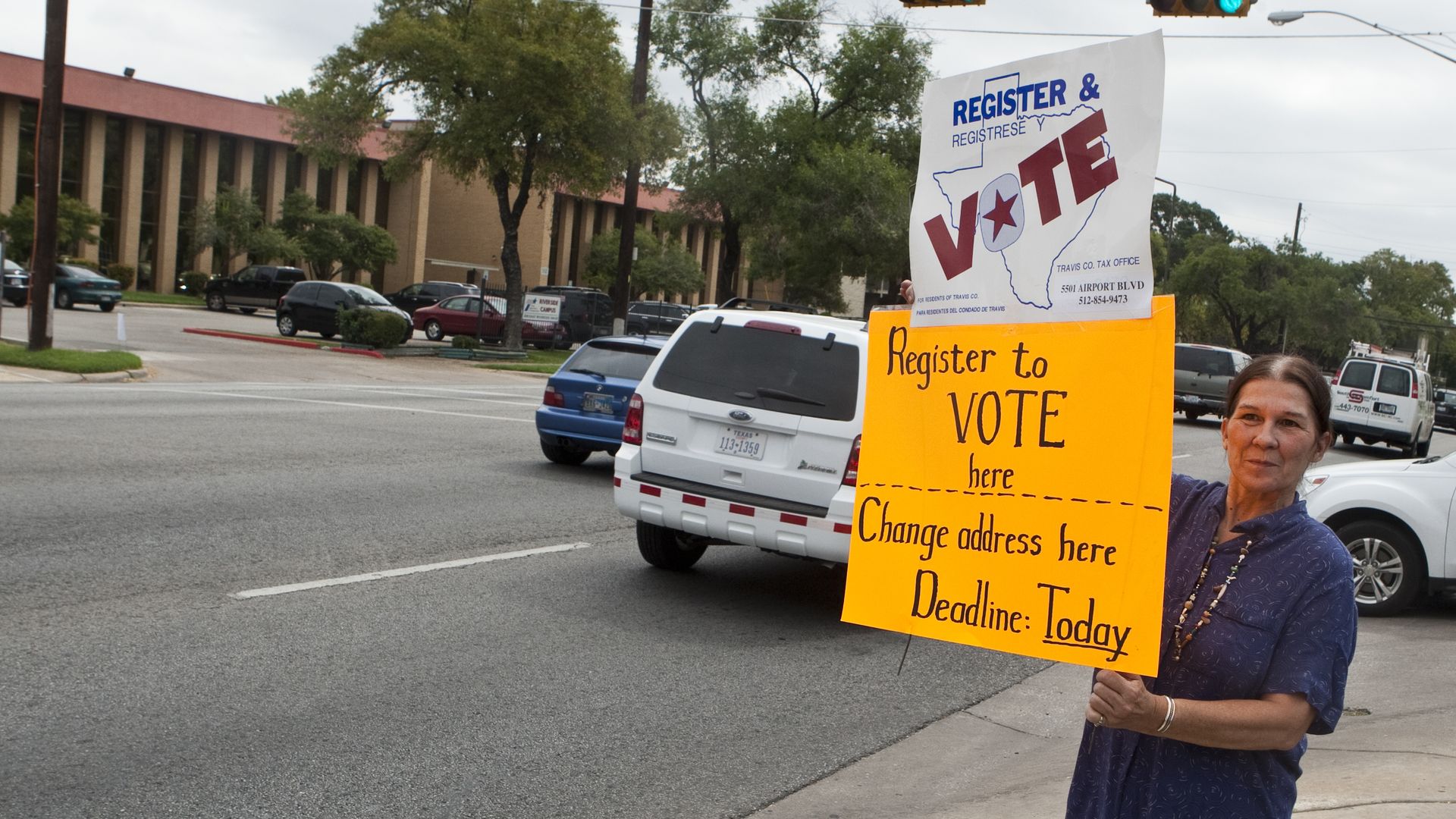 A woman asking people to register to vote in Texas