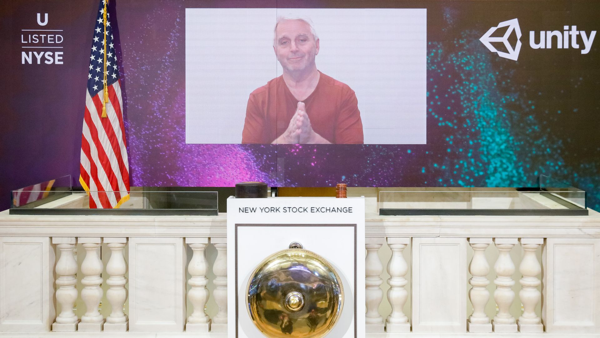 Unity CEO John Riccitiello virtually ringing the NYSE bell as the company begins trading on Friday.