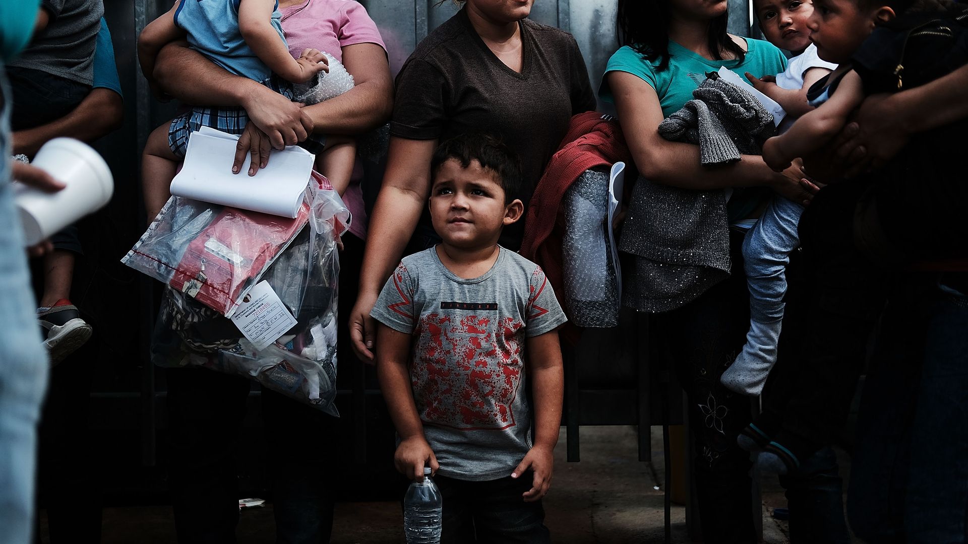 Dozens of women and their children, many fleeing poverty and violence in Honduras, Guatamala and El Salvador, arrive at a bus station following release from Customs and Border Protection in Texas.
