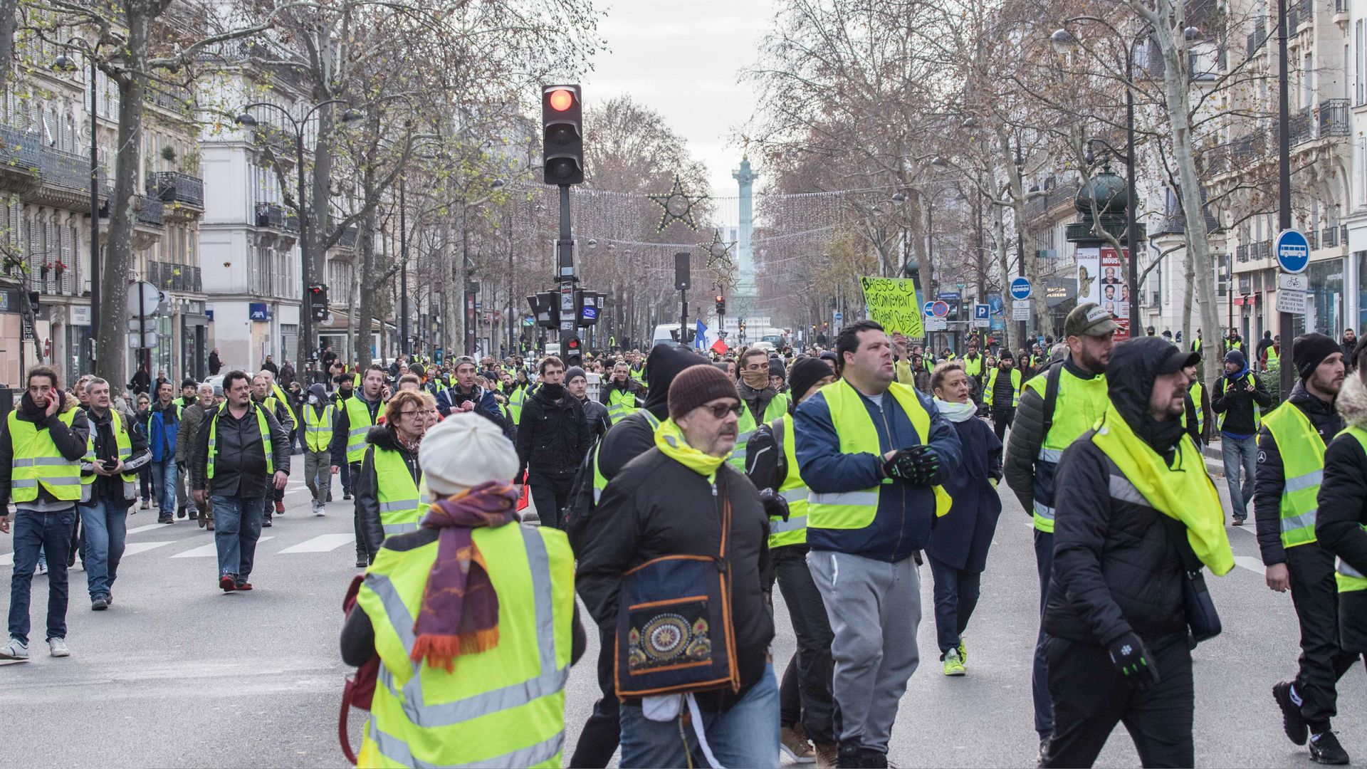 yellow vest protestors in a paris street