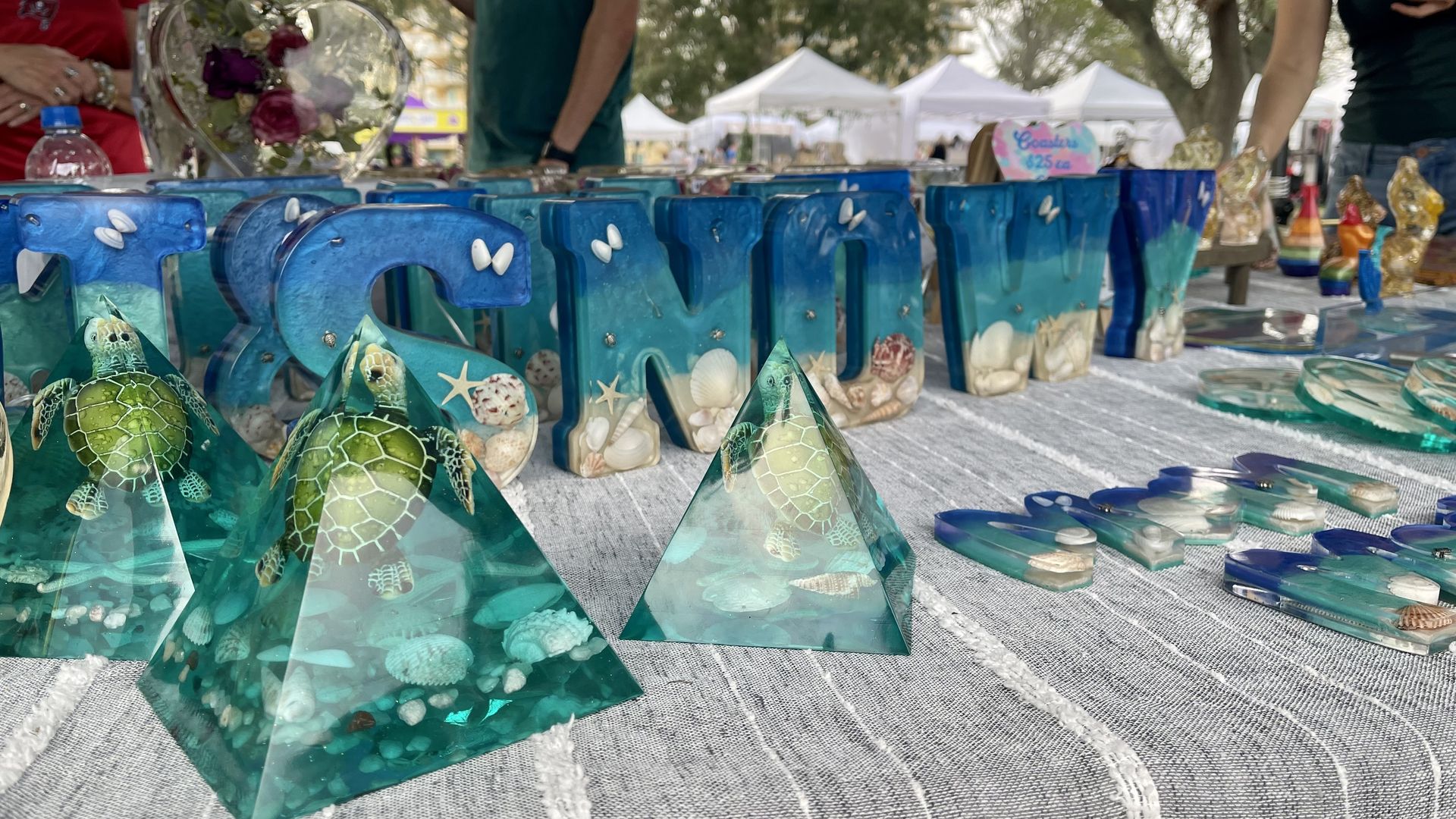 Resin letters that look like beaches positioned to spell "snowy"