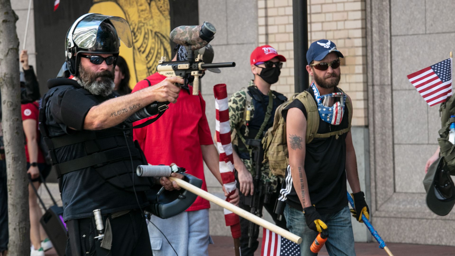 The Proud Boys, an alt-right group, faces off against Black Lives Matters protesters using mace and a paint ball gun on August 15, 2020 in downtown Portland, Oregon. 