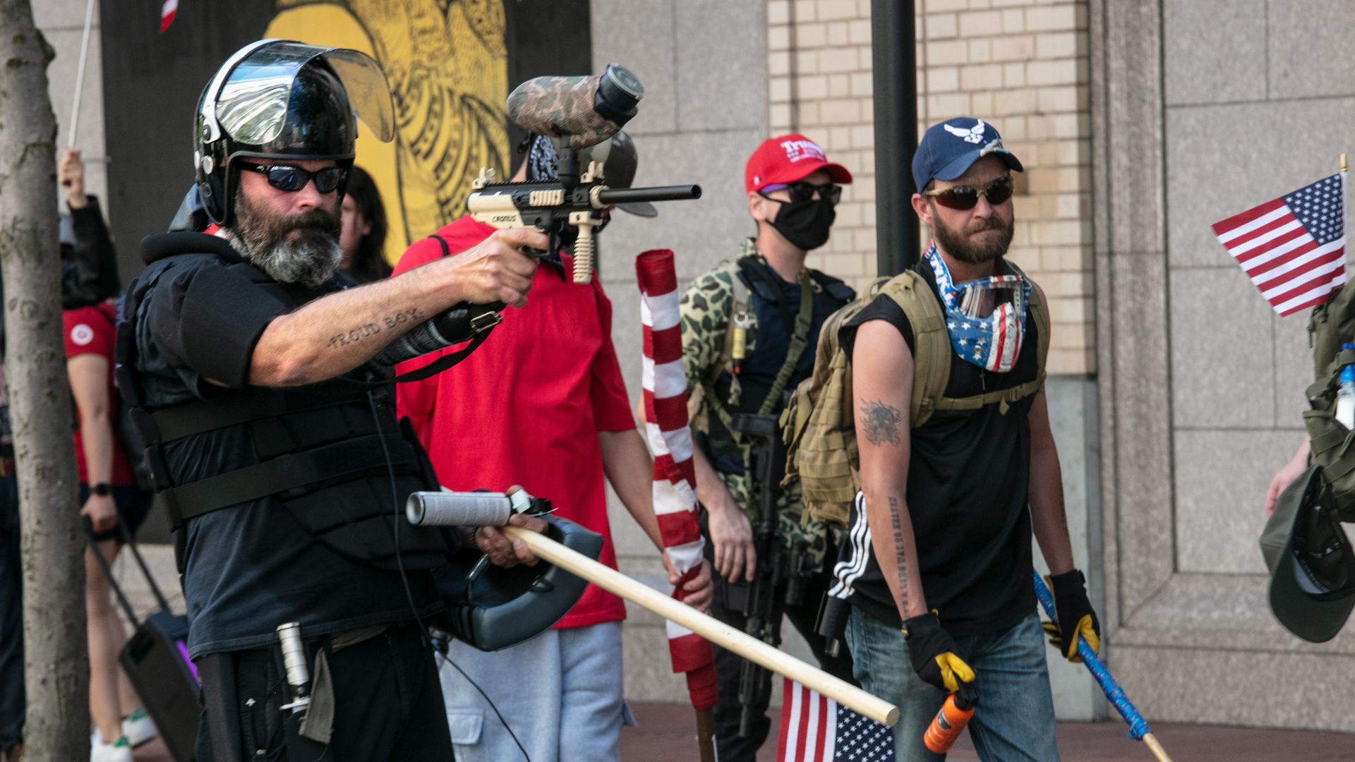 The Proud Boys, an alt-right group, faces off against Black Lives Matters protesters using mace and a paint ball gun on August 15, 2020 in downtown Portland, Oregon.