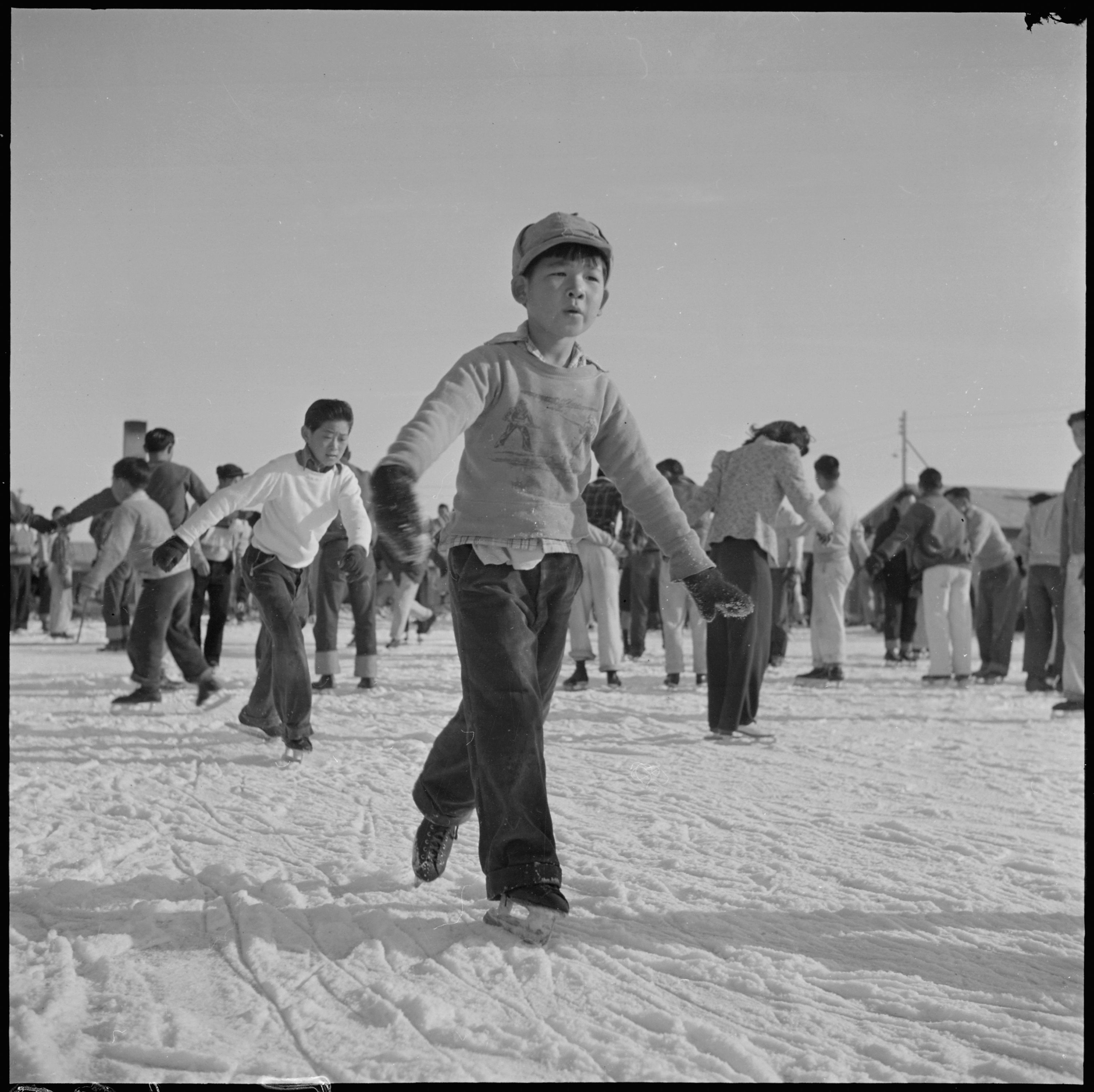 Kids ice skating.