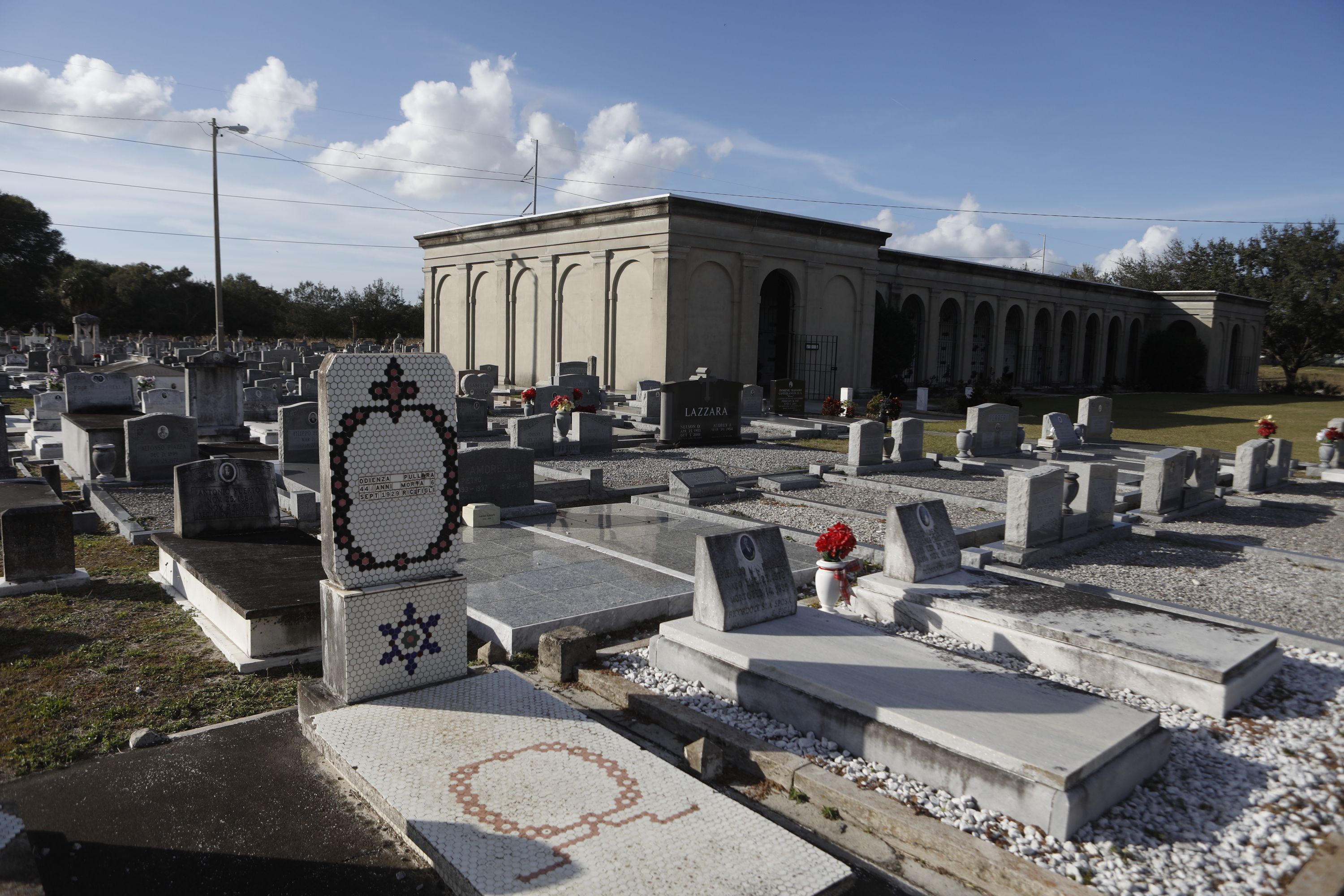 Borders appear to have changed over the years around the L’Unione Italiana Cemetery and Centro Espanol Cemetery in East Tampa. Photo: Octavio Jones/Axios