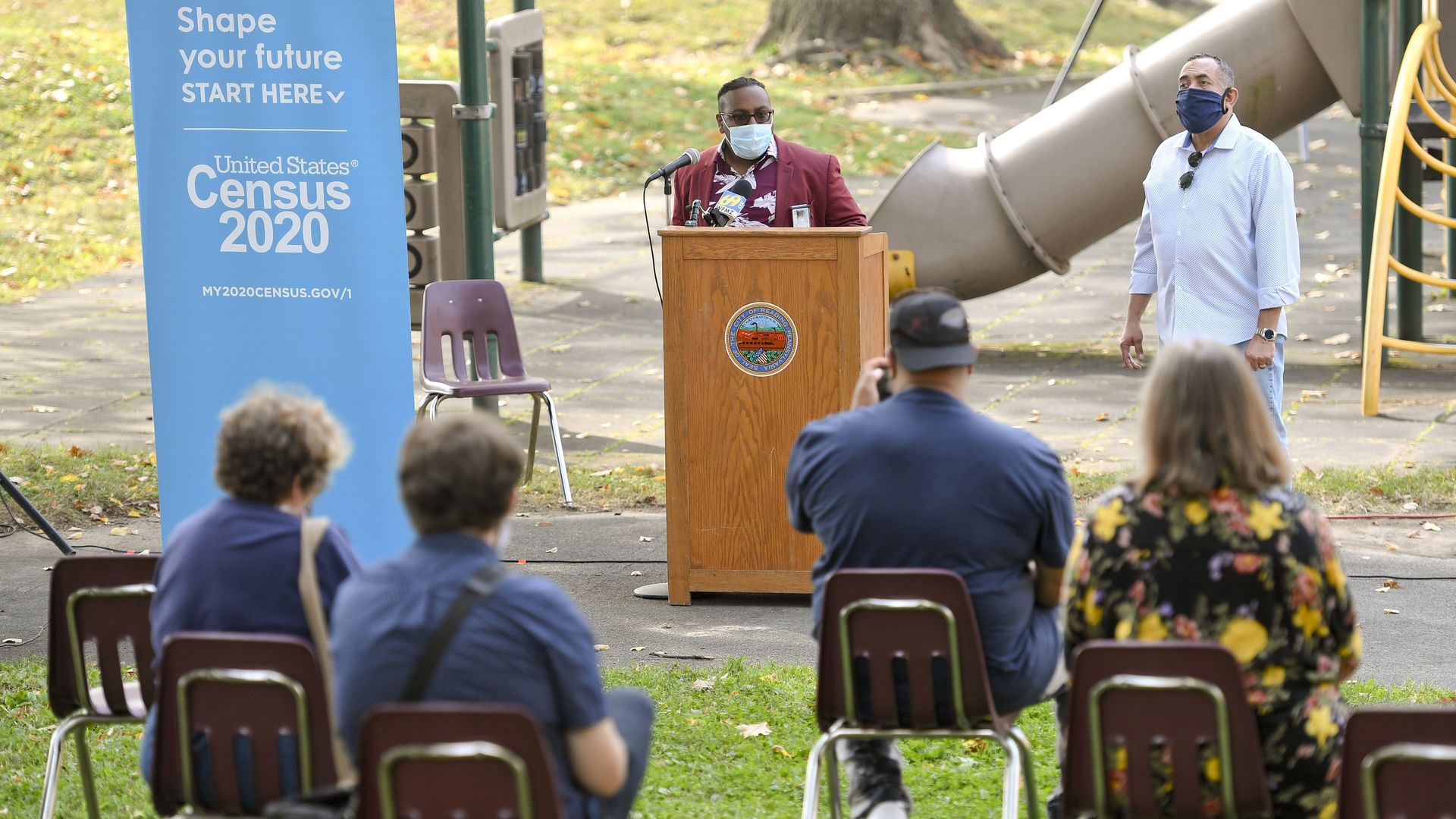Michael Molina, of Census Bureau field office in Reading speaks. Standing to the right is Reading Mayor Eddie Moran. Outside the 3rd and Spruce Recreation Center in Reading Friday
