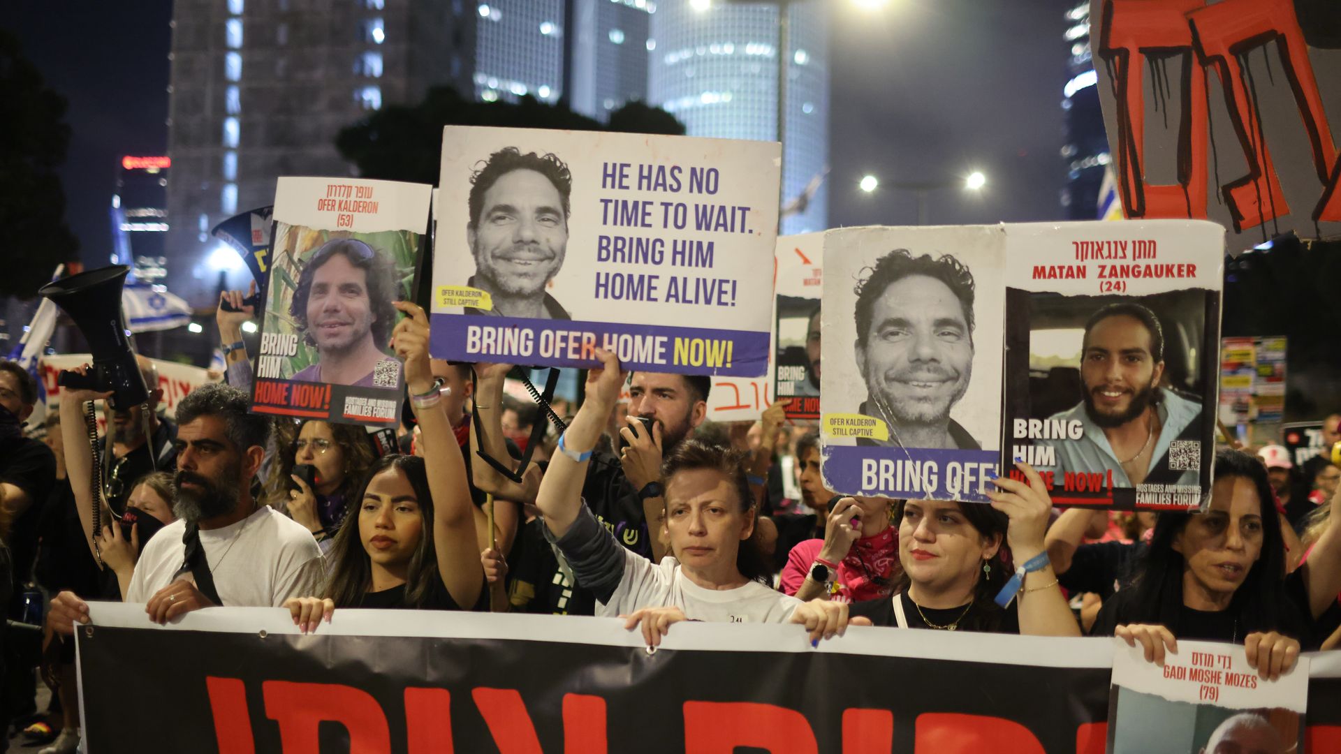 Relatives of hostages and their supporters take part in a protest calling on the government to sign a ceasefire agreement with Hamas