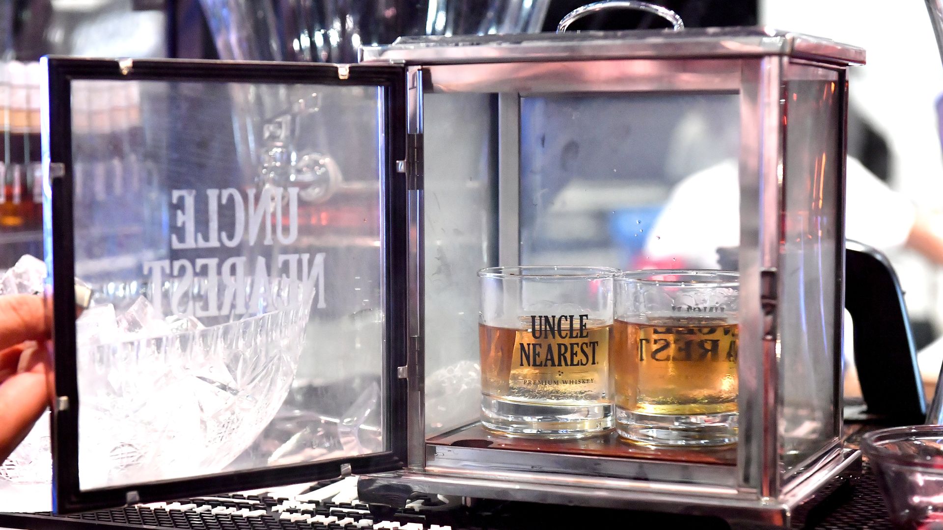 A display case of Uncle Nearest whiskey