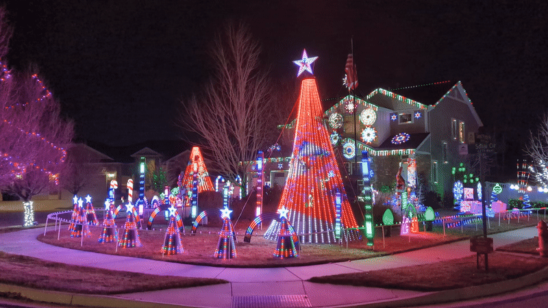 A GIF of digital Christmas lights flashing and moving.