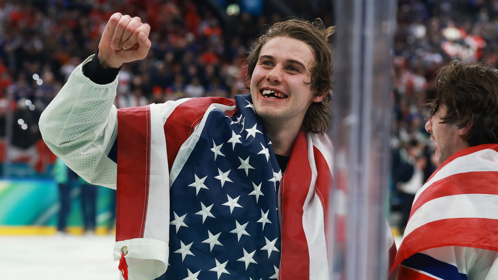 Jack Hughes celebrates after winning gold. 