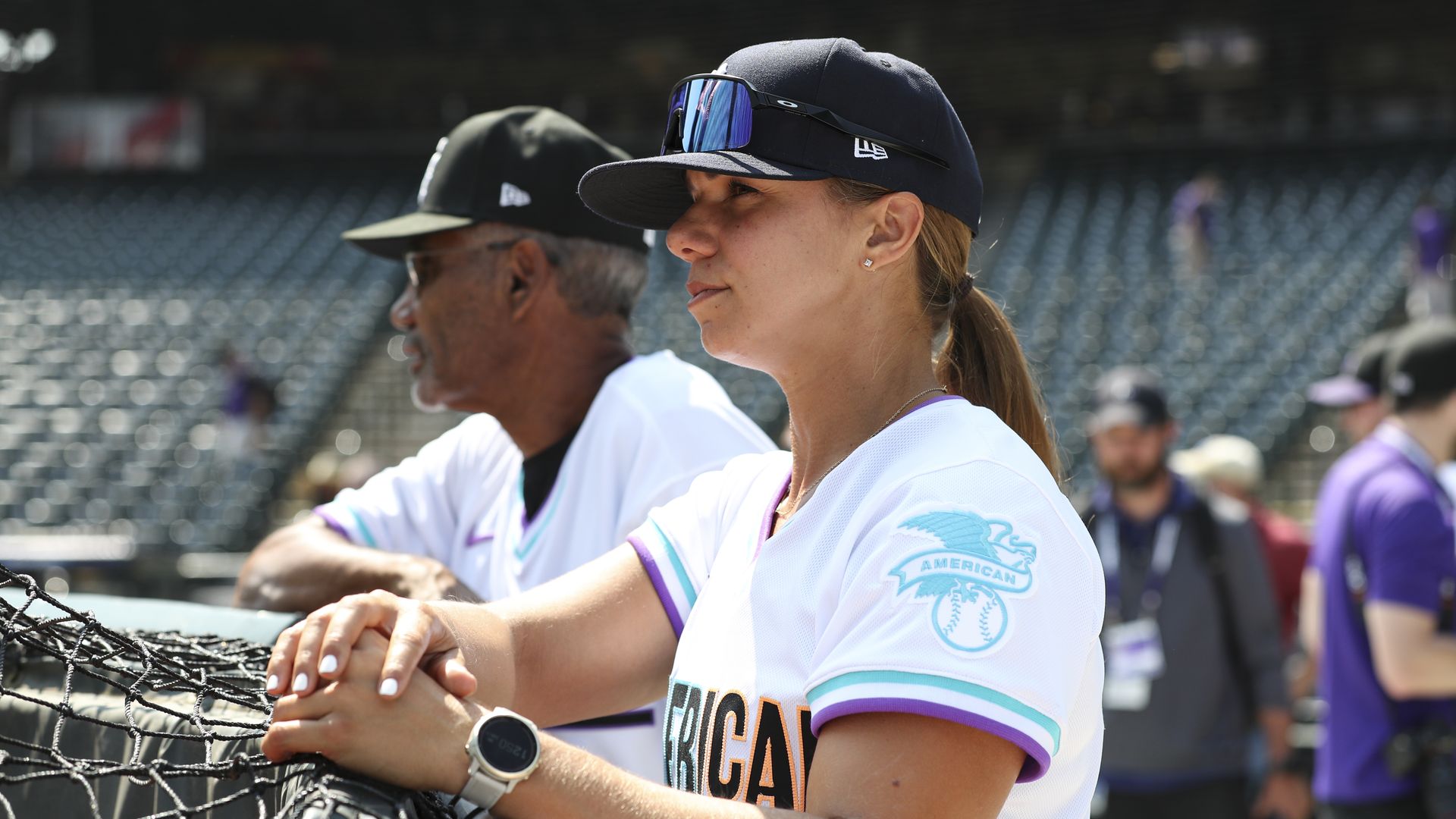  Bench Coach Jerry Manuel #11 and Hitting Coach Rachel Balkovec #9 of the American League Team look on during the 2021 Sirius XM Futures Game.