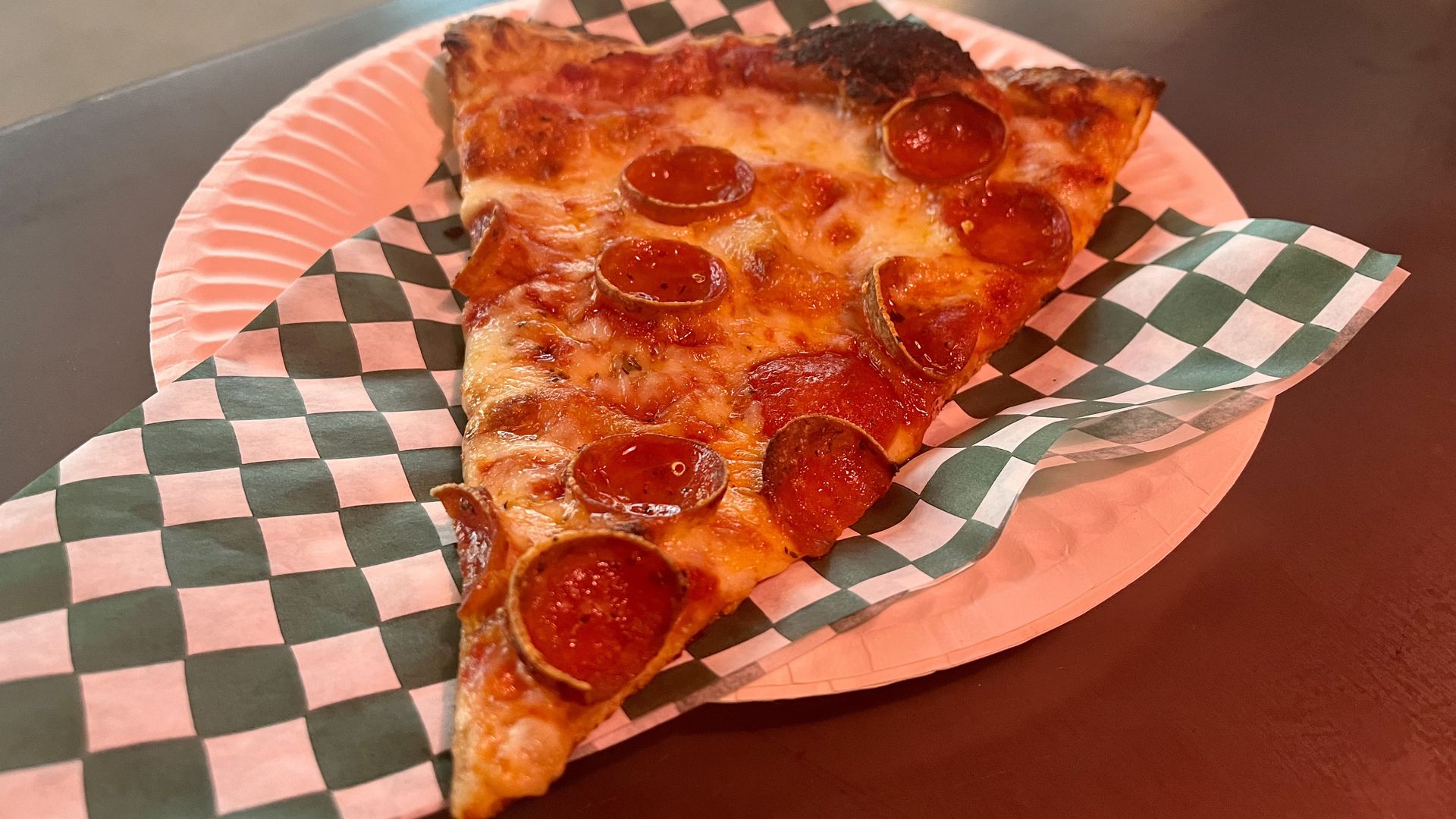 A slice of pepperoni pizza.