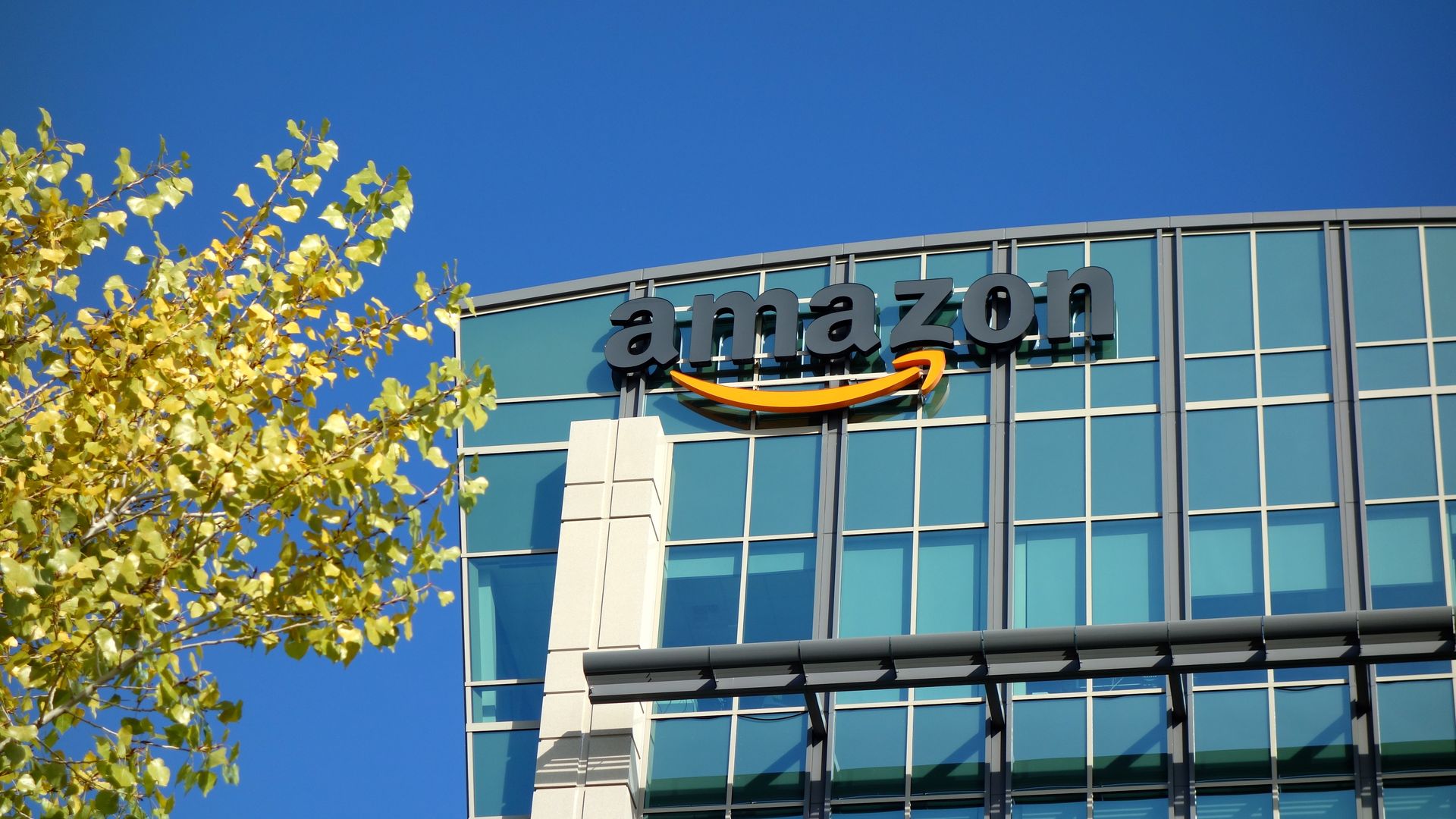 Amazon office building with logo on front.