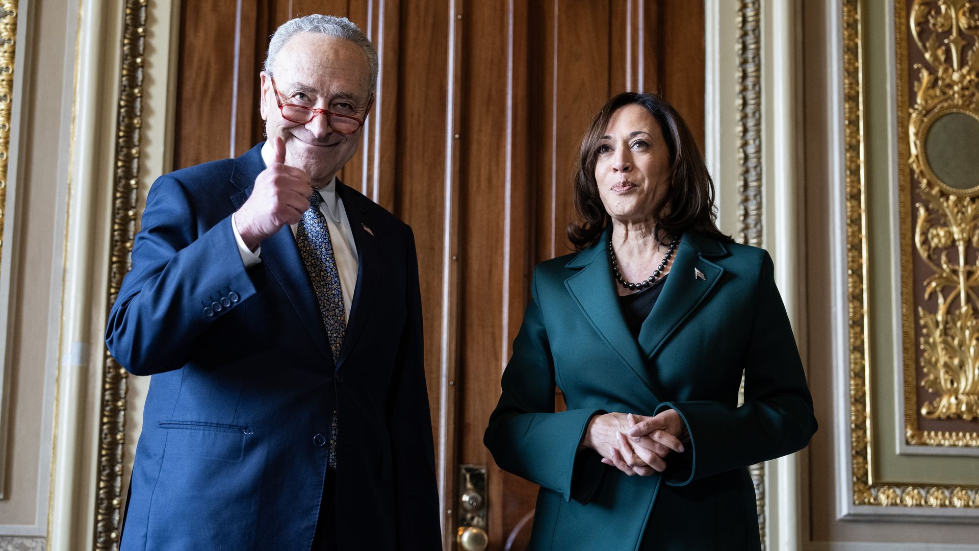 U.S Senate Majority Leader Chuck Schumer (D-NY) and Vice President Kamala Harris speak to reporters after Schumer awarded her a golden gavel outside of the Senate chamber at the U.S. Capitol on December 5, 2023 in Washington, DC.